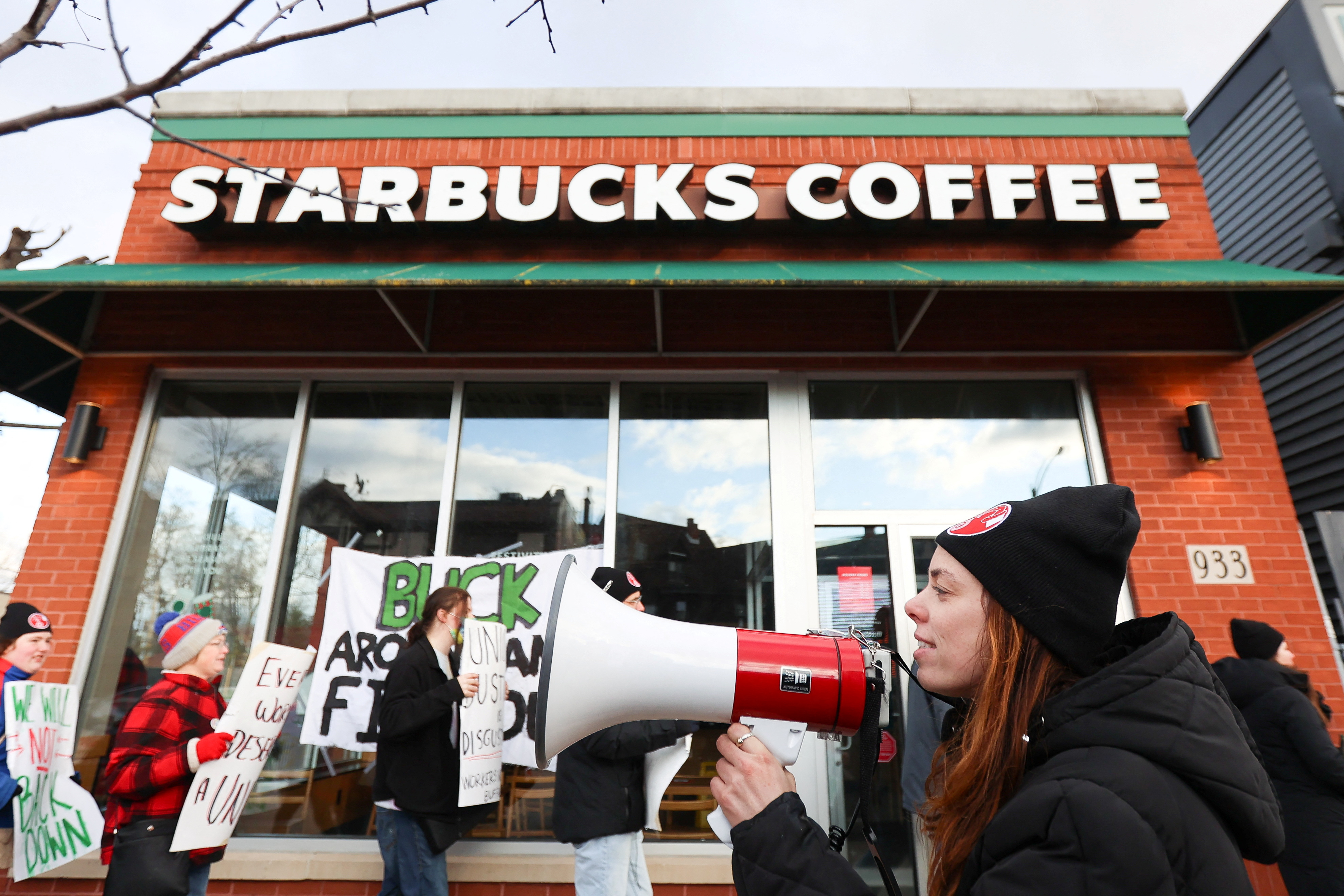 Starbucks workers attend a rally as they go on a one-day strike outside a store in Buffalo, New York, U.S., November 17, 2022. REUTERS/Lindsay DeDario