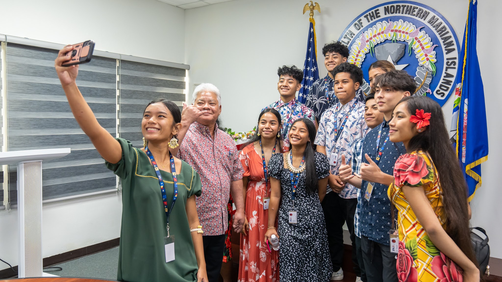 Junior State of America participants pose for a photo with Gov. Arnold I. Palacios.
