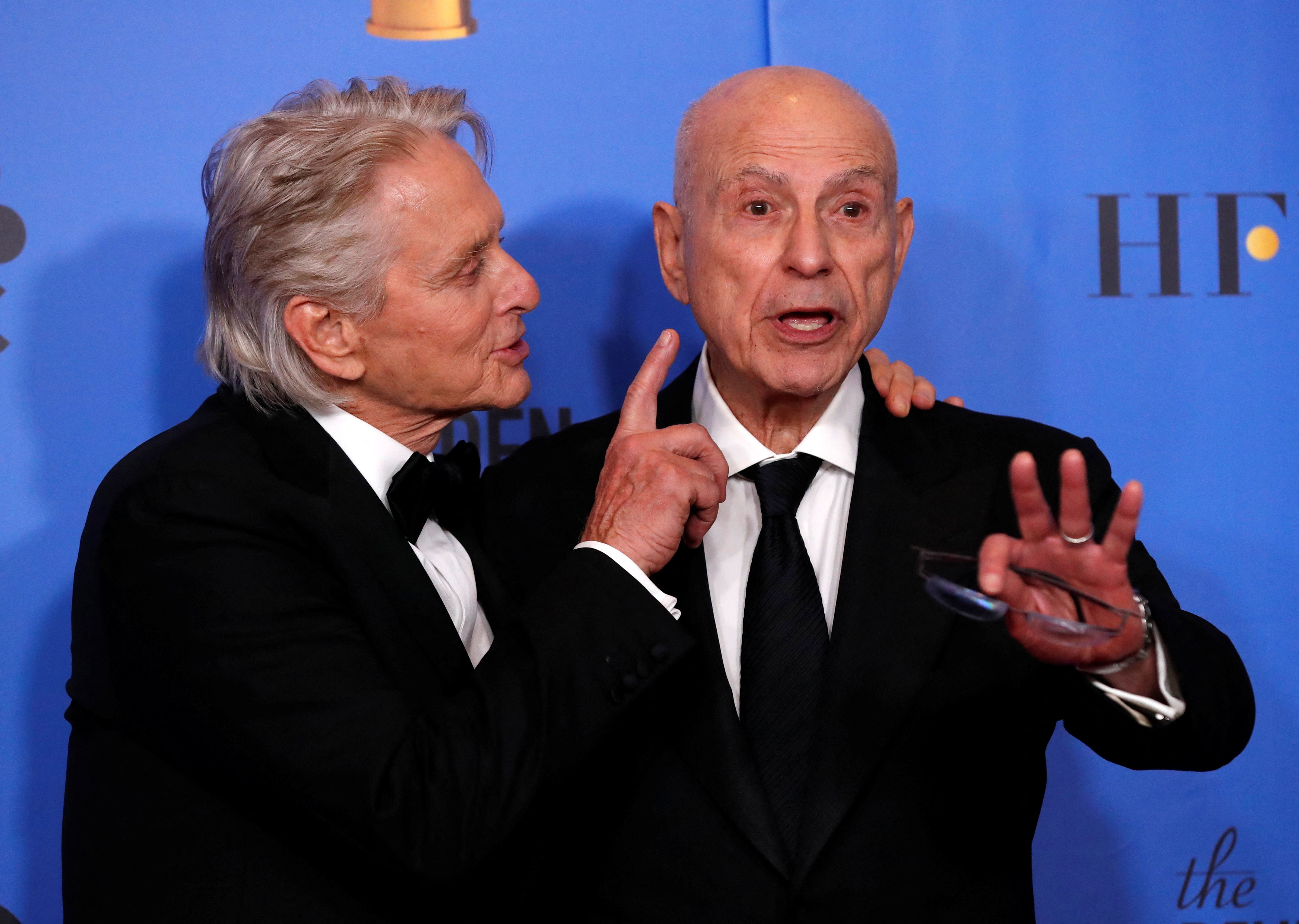 FILE PHOTO: 76th Golden Globe Awards - Photo Room - Beverly Hills, California, U.S., January 6, 2019 - Michael Douglas (L) and Alan Arkin pose backstage. REUTERS/Mario Anzuoni/File Photo