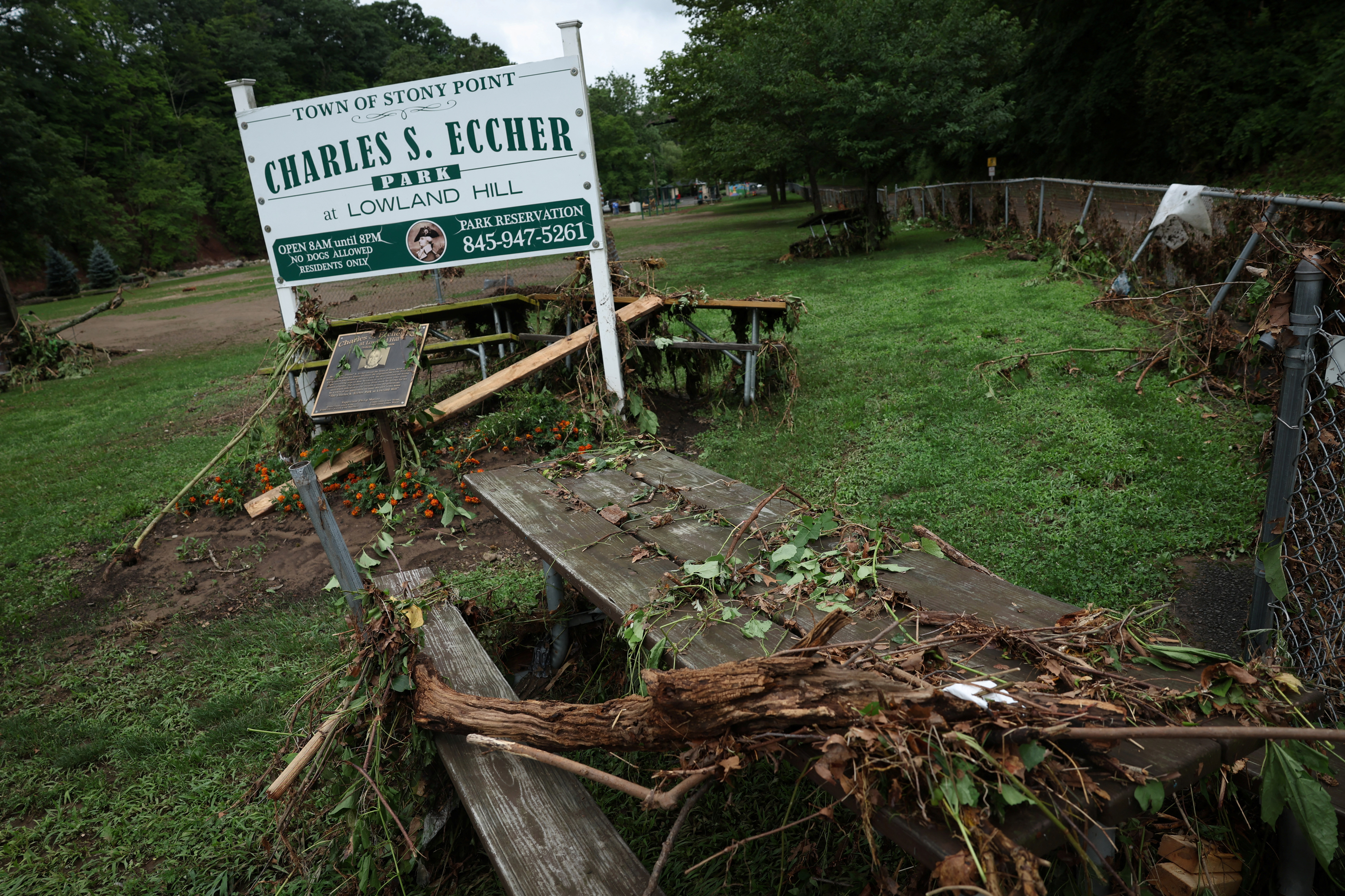 Debris is pictured in Charles S. Eccher Park from overnight flooding along Cedar Pond Brook in Stony Point, New York, U.S., July 10, 2023. REUTERS/Mike Segar