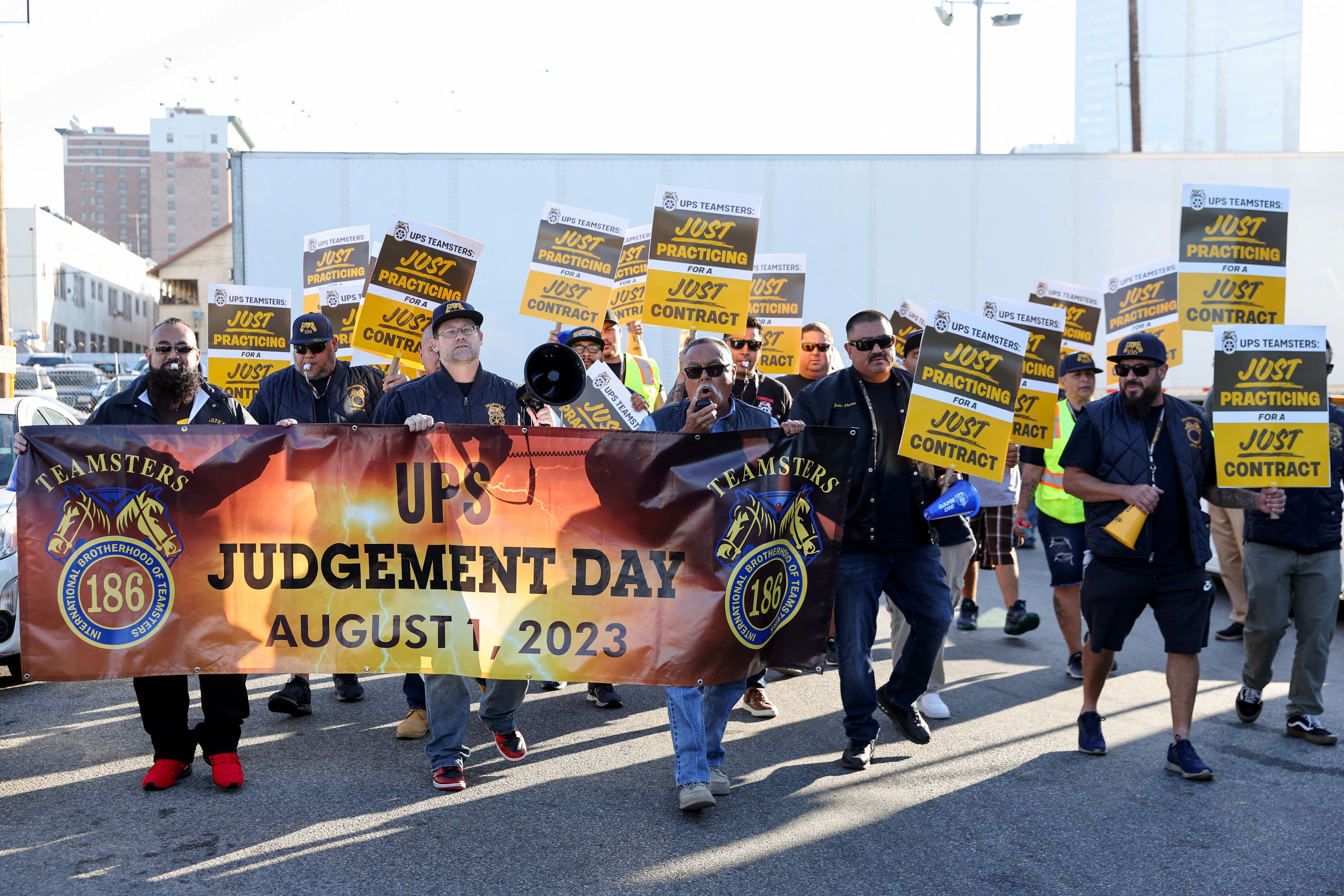 Teamsters employed by UPS hold a rally outside a UPS facility in downtown L.A. as an August 1st strike deadline against the company nears in Los Angeles, California, U.S. July 19, 2023. REUTERS/Mike Blake/File Photo