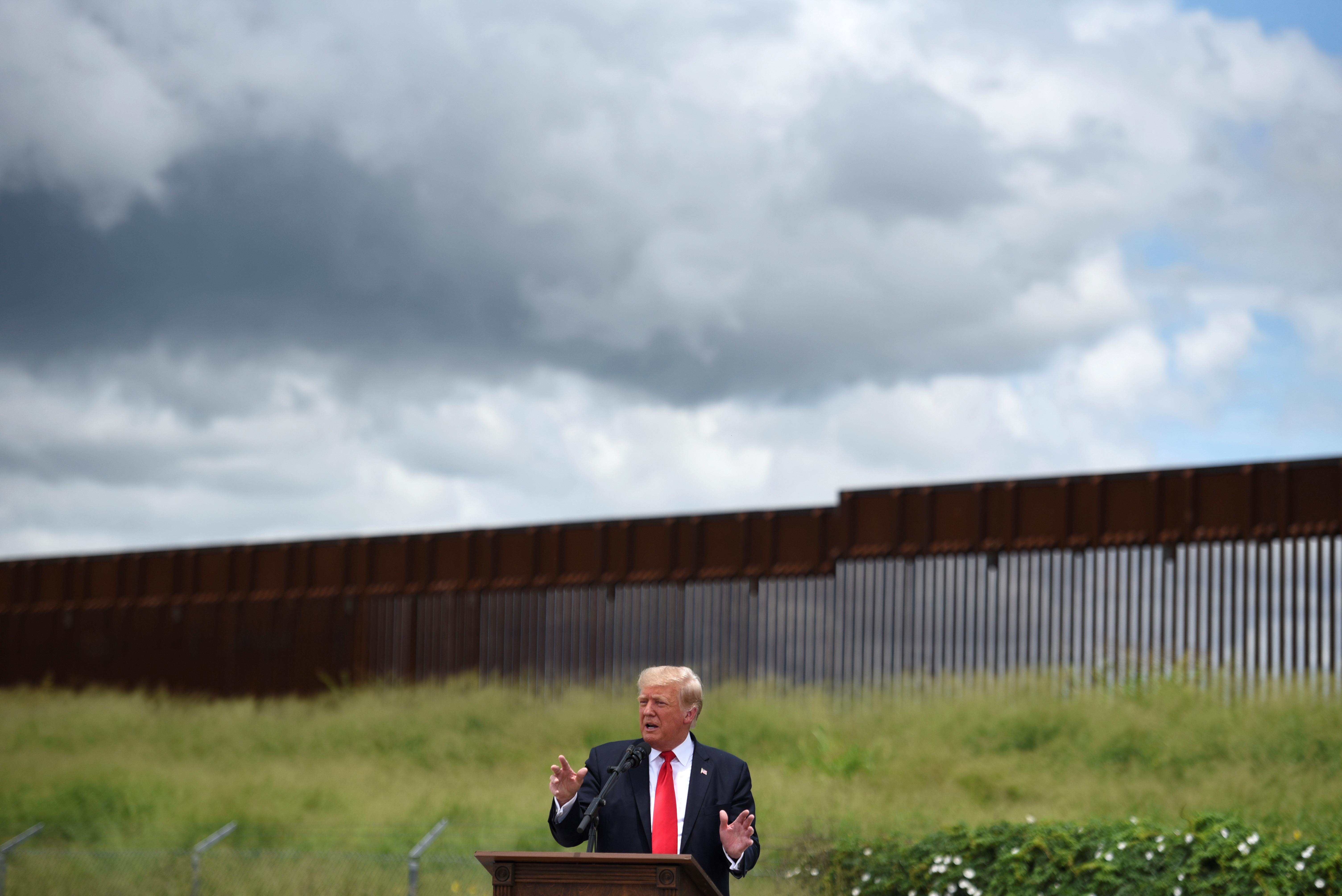 Former U.S. President Donald Trump visits an unfinished section of the wall along the U.S.-Mexico border in Pharr, Texas, U.S. June 30, 2021. REUTERS/Callaghan O'Hare/File Photo