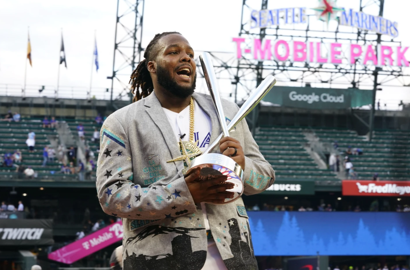 American League’s Vladimir Guerrero Jr. of the Toronto Blue Jays holds his trophy after winning the MLB All-Star baseball Home Run Derby in Seattle, Monday, July 10, 2023.