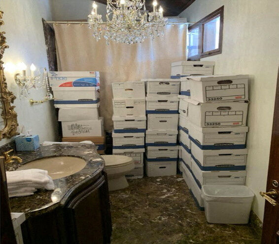 A photo published by the U.S. Justice Department in their charging document against former U.S. President Donald Trump shows boxes of documents stored in a bathroom at Trump's Mar-a-Lago club in Florida in early 2021 as seen embedded in the document released by the Justice Department in Washington, U.S. June 9, 2023. U.S. Justice Department/Handout via Reuters/File Photo