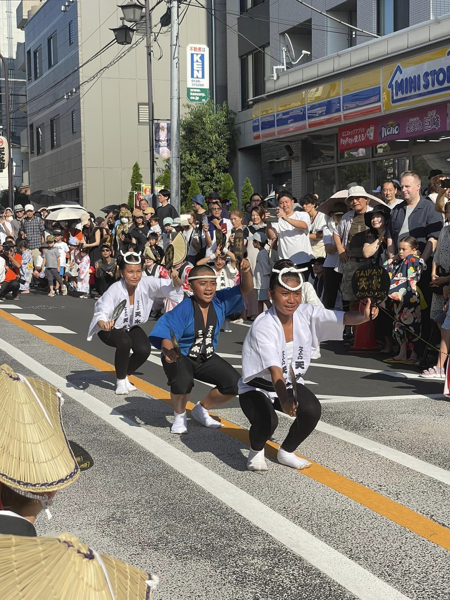 The Saipan Awaodori team members perform at the 12th Shirogane Awaodori Festival on July 16, 2023.