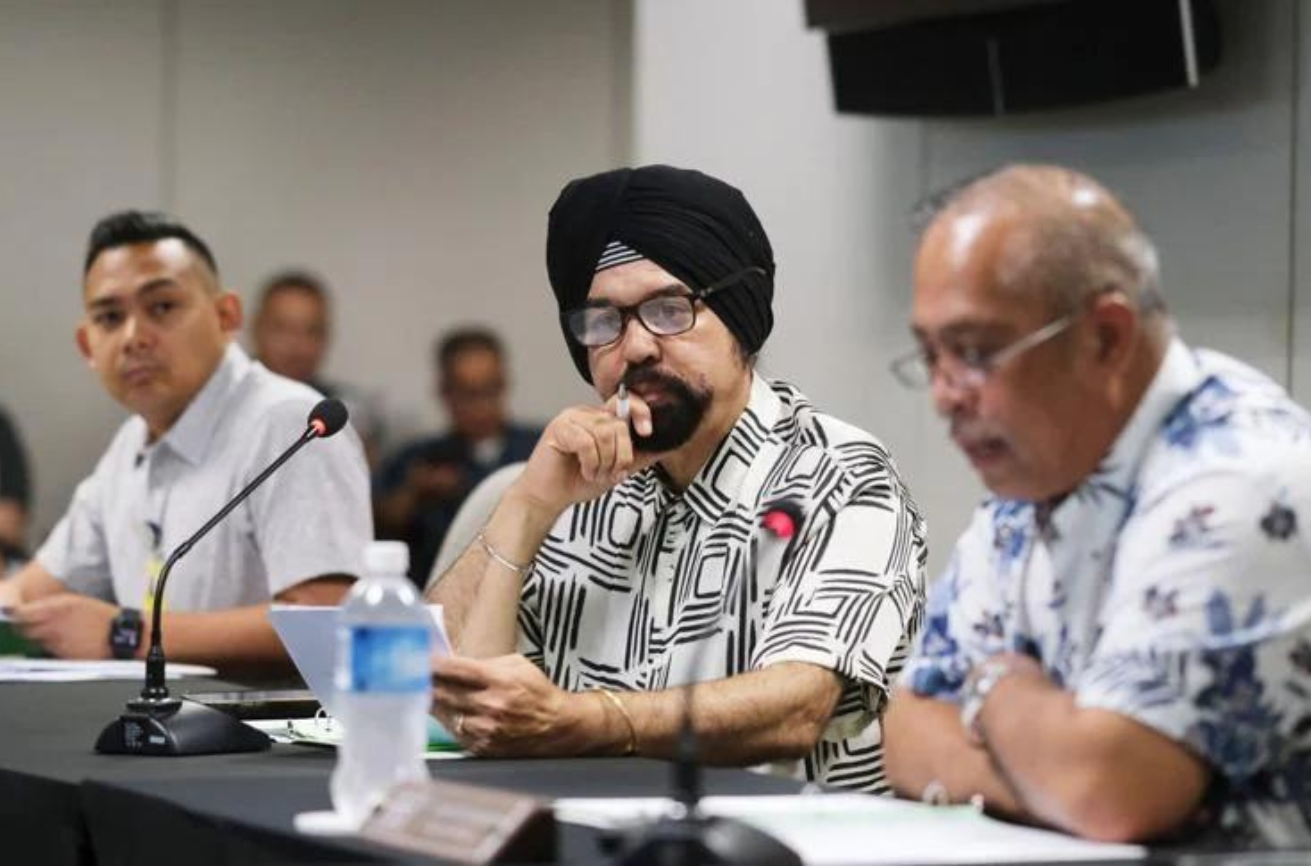 Guam International Airport Authority board of directors Vice Chairperson Gurvinder "Bic" Sobti, center, convenes a special meeting in the GIAA conference room Tuesday, July 18, 2023.