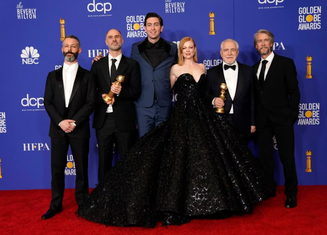 The cast of "Succession" poses backstage with their Best Television Series for Drama award at the 77th Golden Globe Awards in Beverly Hills, California, Jan. 5, 2020.
