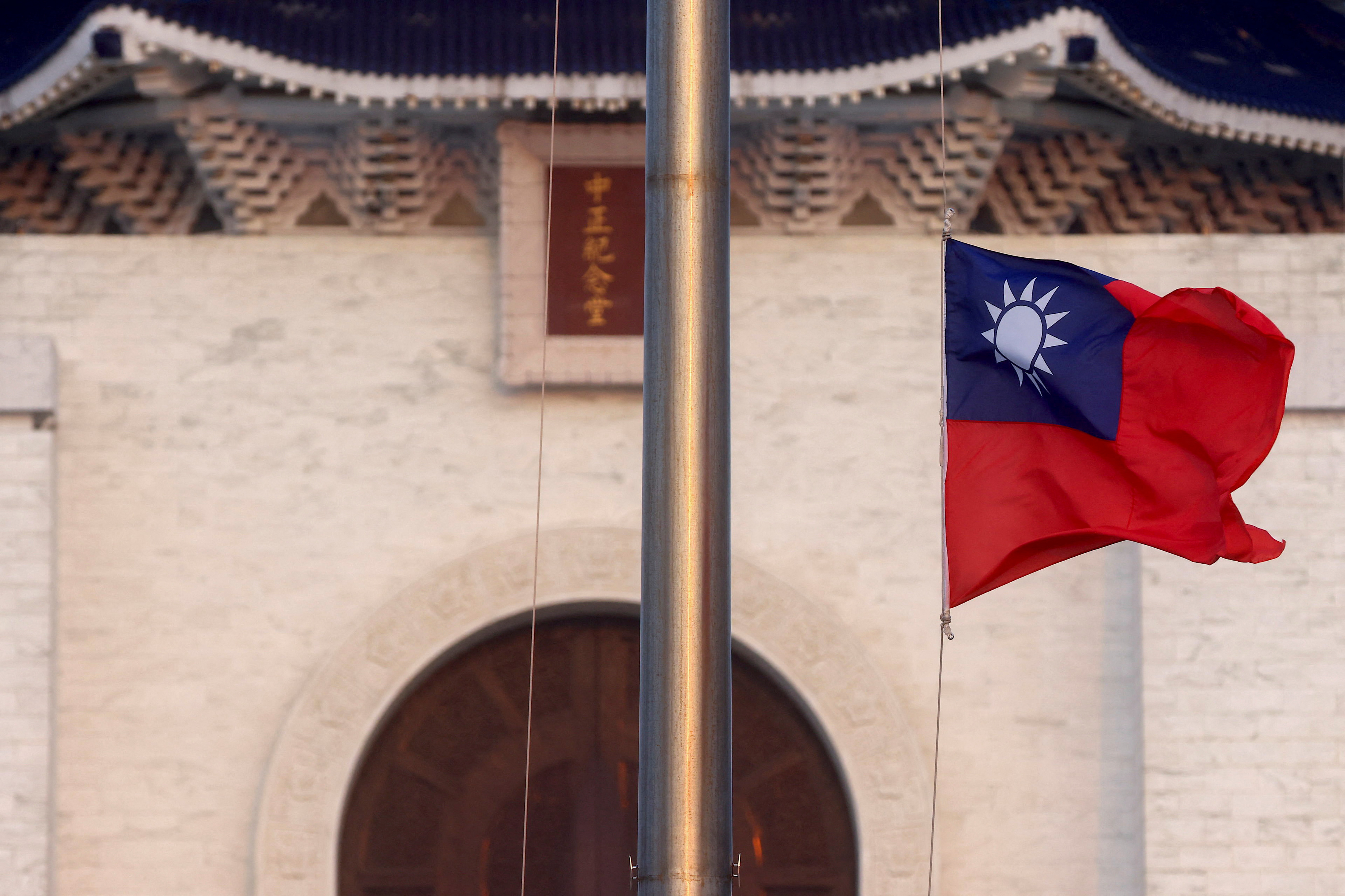 A Taiwan flag can be seen at Liberty Square in Taipei, Taiwan, July 28, 2022. REUTERS/Ann Wang/File Photo