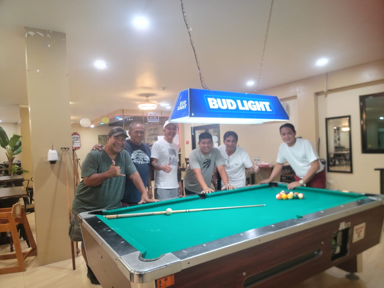 The Rendezvous IT&E Destroyers and Black 8 Slayers pose for a photo after their Tuesday Division game in the 2023 SBA Budweiser Open 8-Ball League on Tuesday at Rendezvous Restaurant, Saipan Vegas.