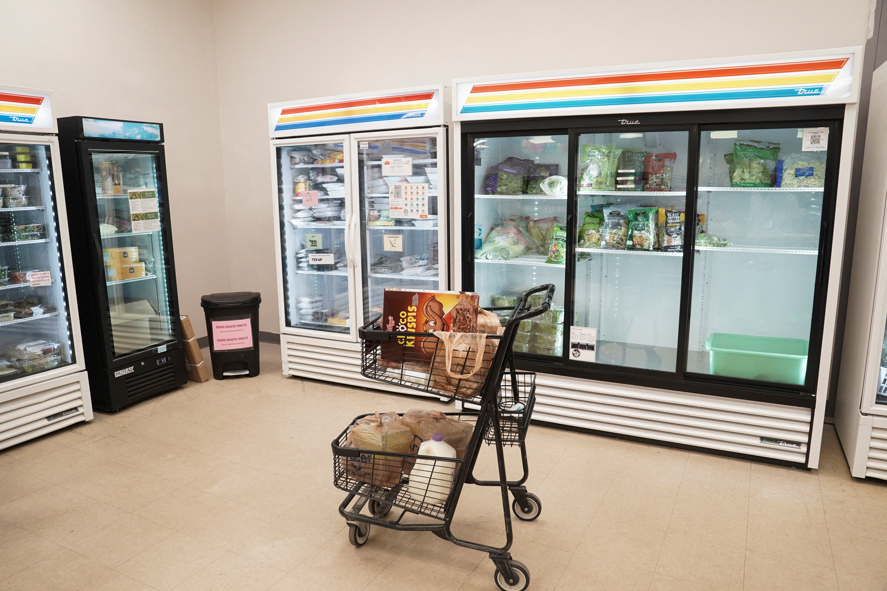 A cart sits in the refrigerated section of The Community Assistance Center food pantry, in Atlanta, Georgia, U.S. April 12, 2023. REUTERS/Megan Varner/File Photo