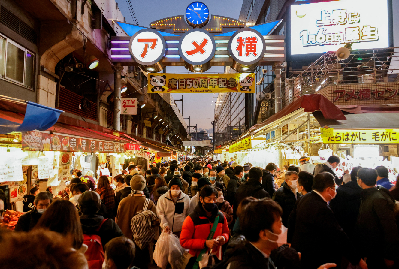 Shoppers crowd at the Ameyoko shopping district, which is Tokyo's biggest street food market, as they do their last-minute New Year's shopping in Tokyo, Japan, Dec. 29, 2022.
