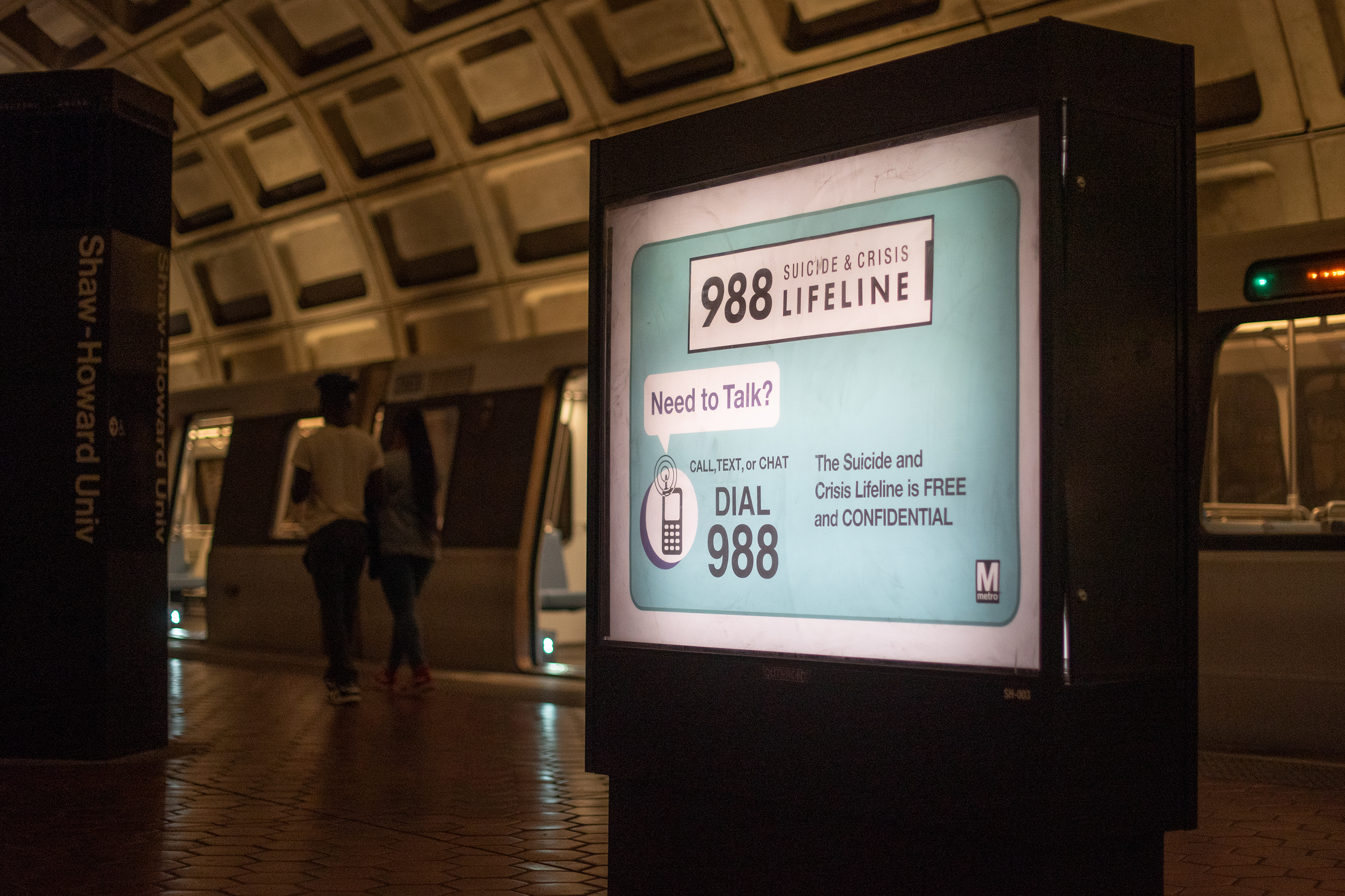 An advertisement for the Suicide and Crisis Lifelineâ€™s 988 hotline is seen at the Shaw-Howard University subway station in Washington, D.C. (Eric Harkleroad/KFF Health News/TNS)