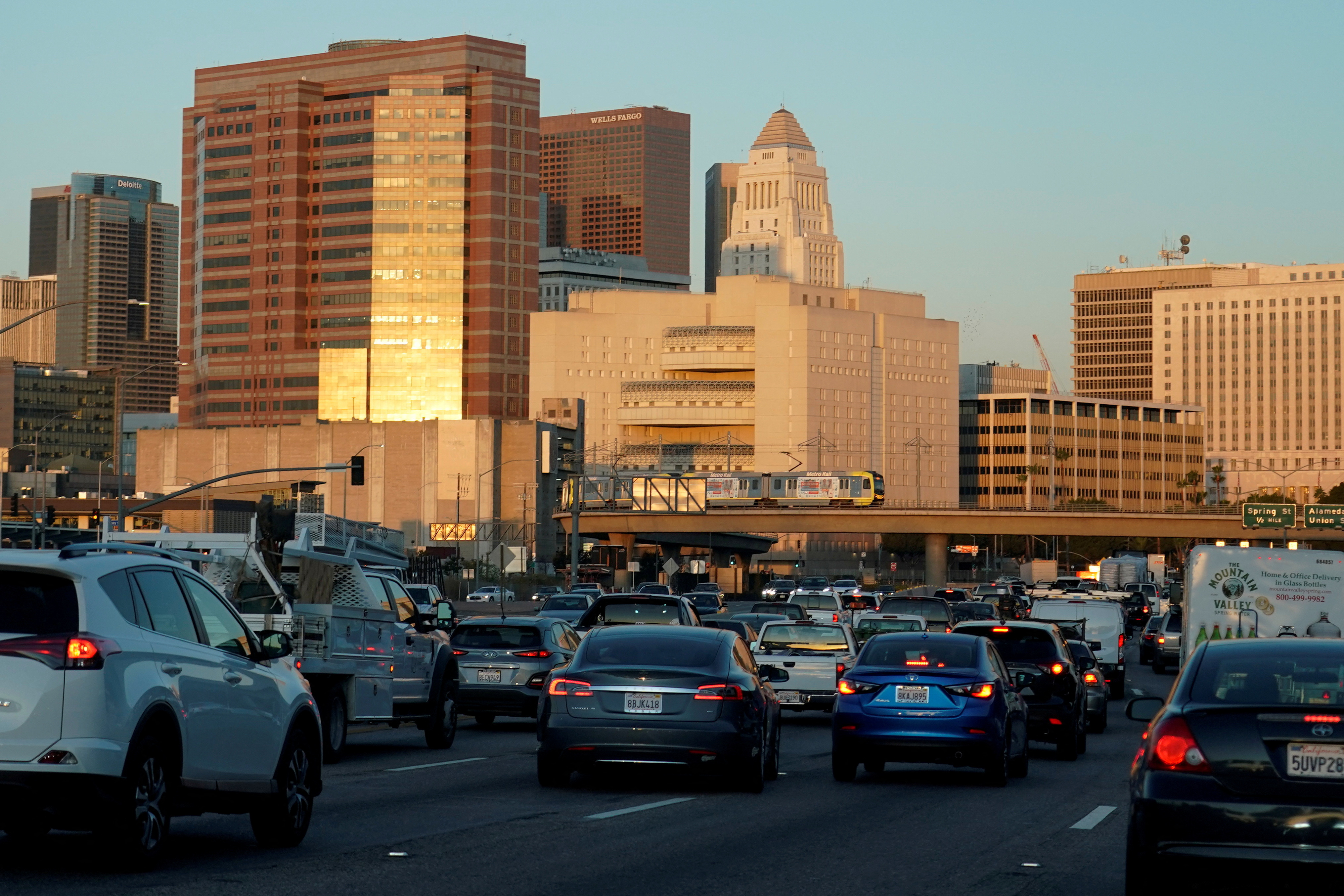 Traffic travels along a highway next to Los Angeles, California, U.S. October 11, 2019. REUTERS/Mike Blake/File Photo