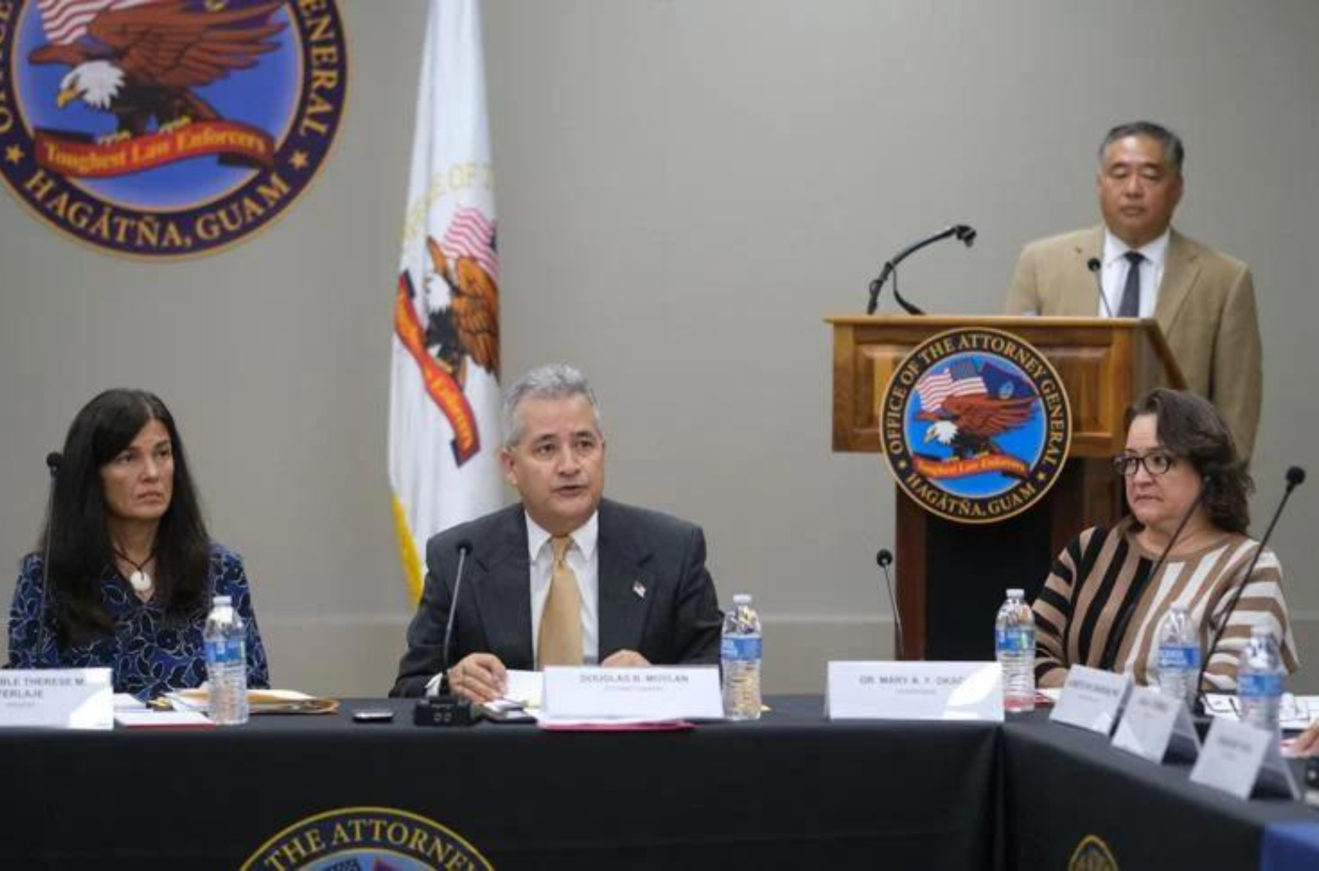 Attorney General Douglas Moylan, second from left, holds a roundtable discussion Tuesday, July 18, 2023, at the AG's conference room at the ITC Building in Tamuning. From left are Speaker Therese Terlaje; AG Moylan; attorney Fred Nishihara; and Mary Okada, Guam Education Board chairperson and president of Guam Community College. 