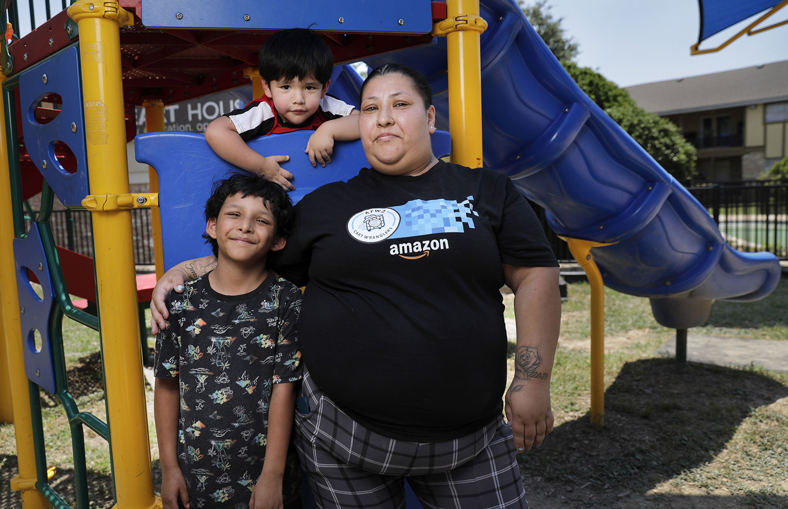 Victoria Halstead with two of her children, Jovani, 8, and Ismael, 3, on June 22 at the apartment complex playground where her 17-year-old son, Mark Halstead used to play as a child. Mark recently settled his manslaughter case in a plea bargain agreement after being in the Dallas County Juvenile Department inside the Henry Wade Juvenile Justice Center. He's been there since July 2022. (Tom Fox/Dallas Morning News/TNS)