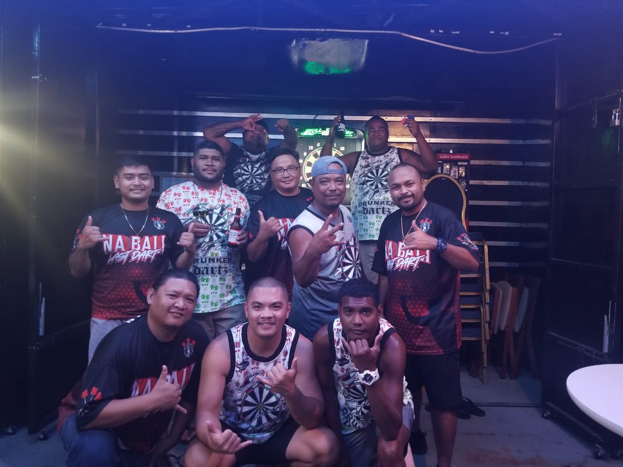Bourbon Drunken Dartz and Spicy Thai Na Bali Last Dart B players pose for a photo after a game Thursday in the Flame Tree B Division of the 2023 SEDA Bud Light Dart League at Bourbon Street Bar.