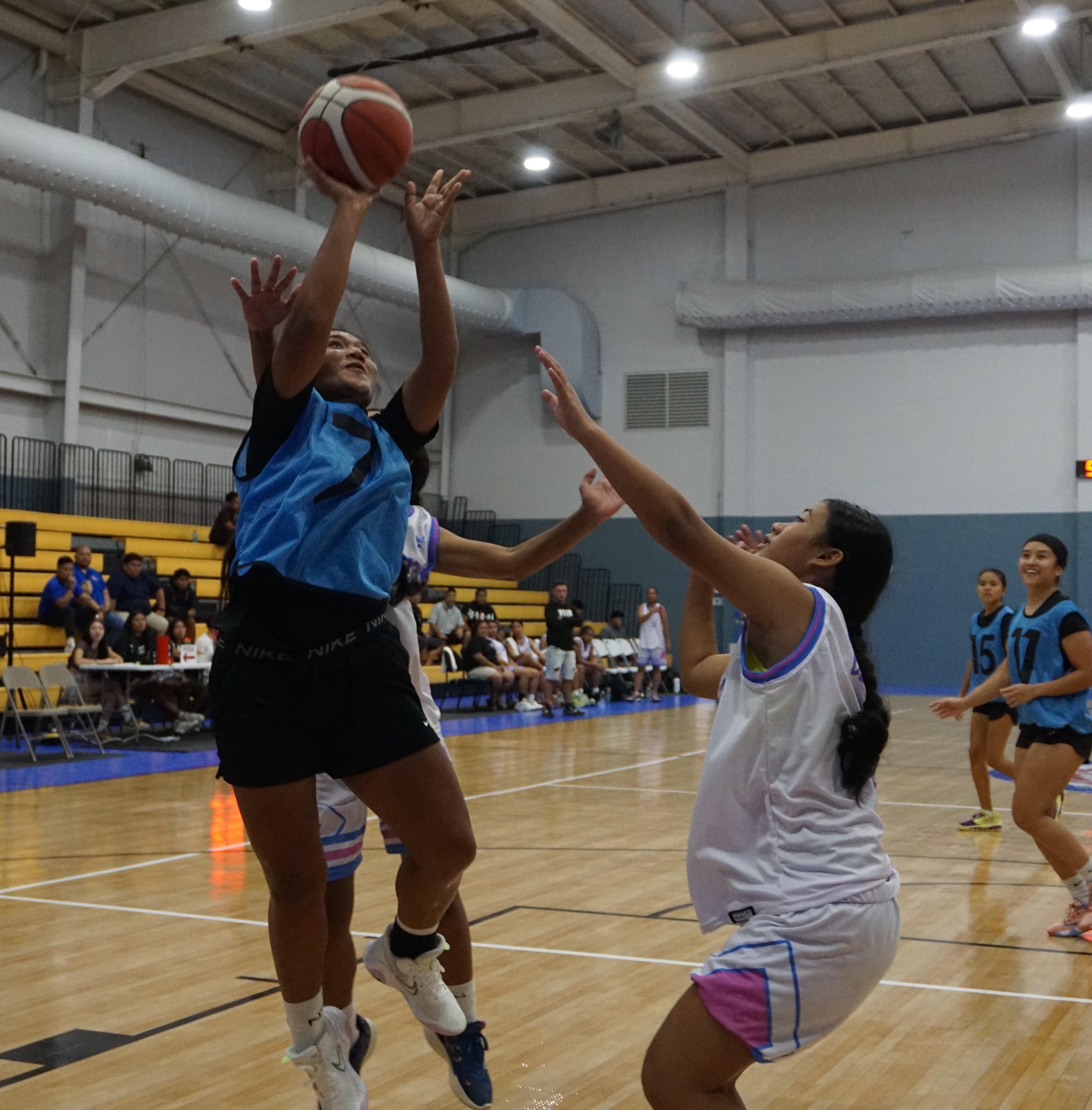 The Ol'Aces' Cassandra Camacho takes the uncontested shot against Pohnpei during a women's division match of the 2023 NMI-Pohnpei Goodwill Basketball Games Monday at the Ada gym.