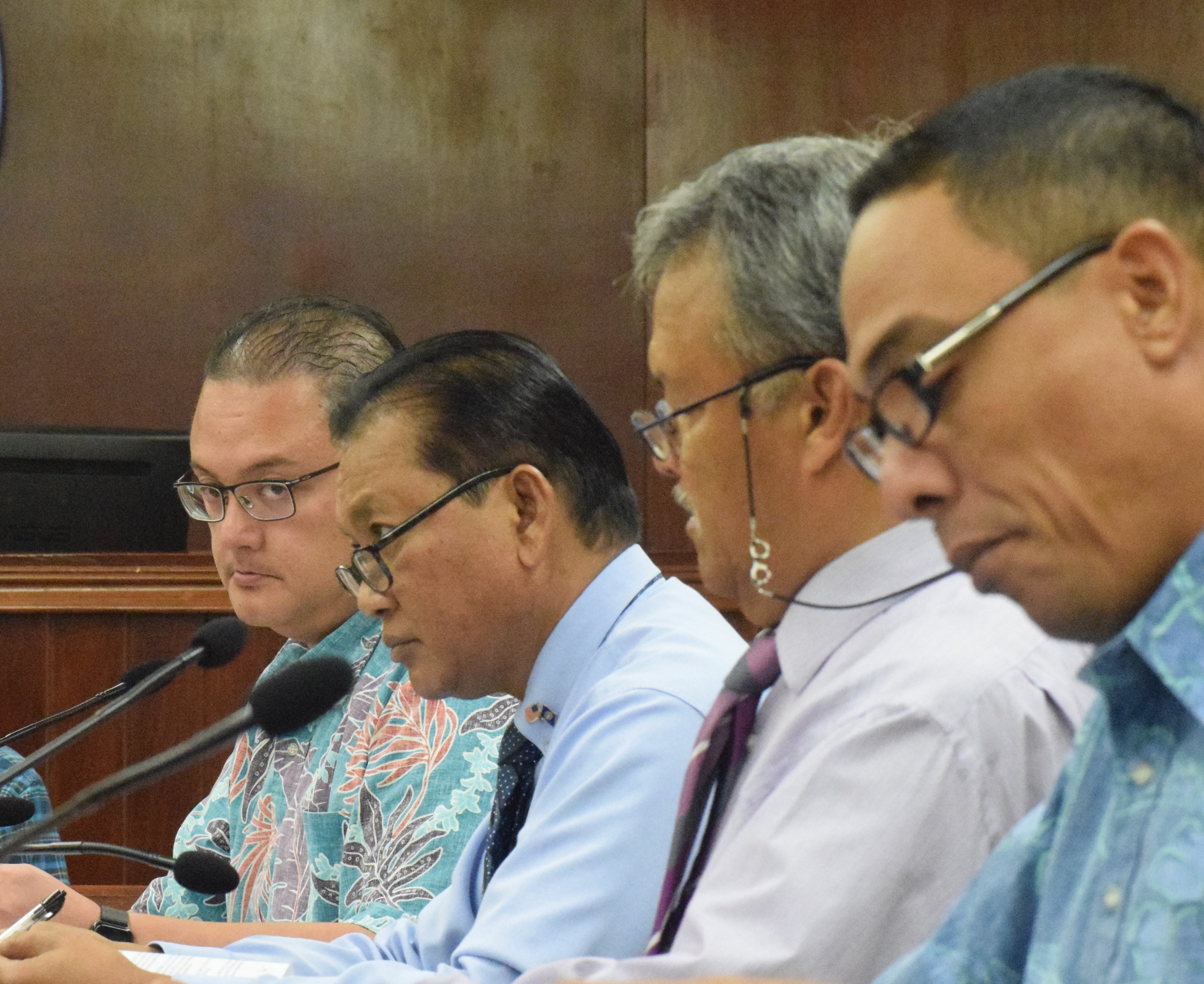 Sen. Frank Q. Cruz, second left, with Senate Vice President Donald M. Manglona, left, Sen. Paul A. Manglona second right, and Sen. Dennis James Mendiola during a Senate session. 