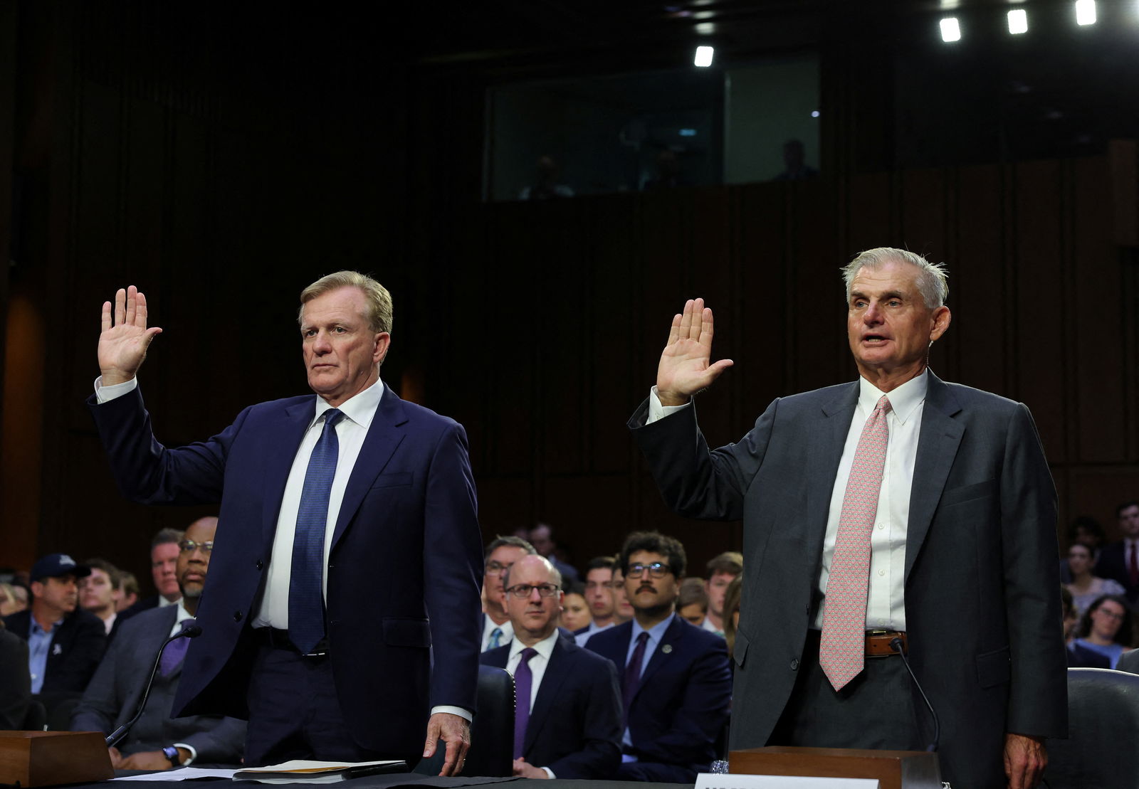 PGA Tour Chief Operating Officer Ron Price and PGA Tour board member Jimmy Dunne are sworn in during a Senate Homeland Security and Governmental Affairs Committee hearing on Capitol Hill to examine the planned PGA Tour-LIV Golf merger in Washington, U.S., July 11, 2023. REUTERS/Evelyn Hockstein