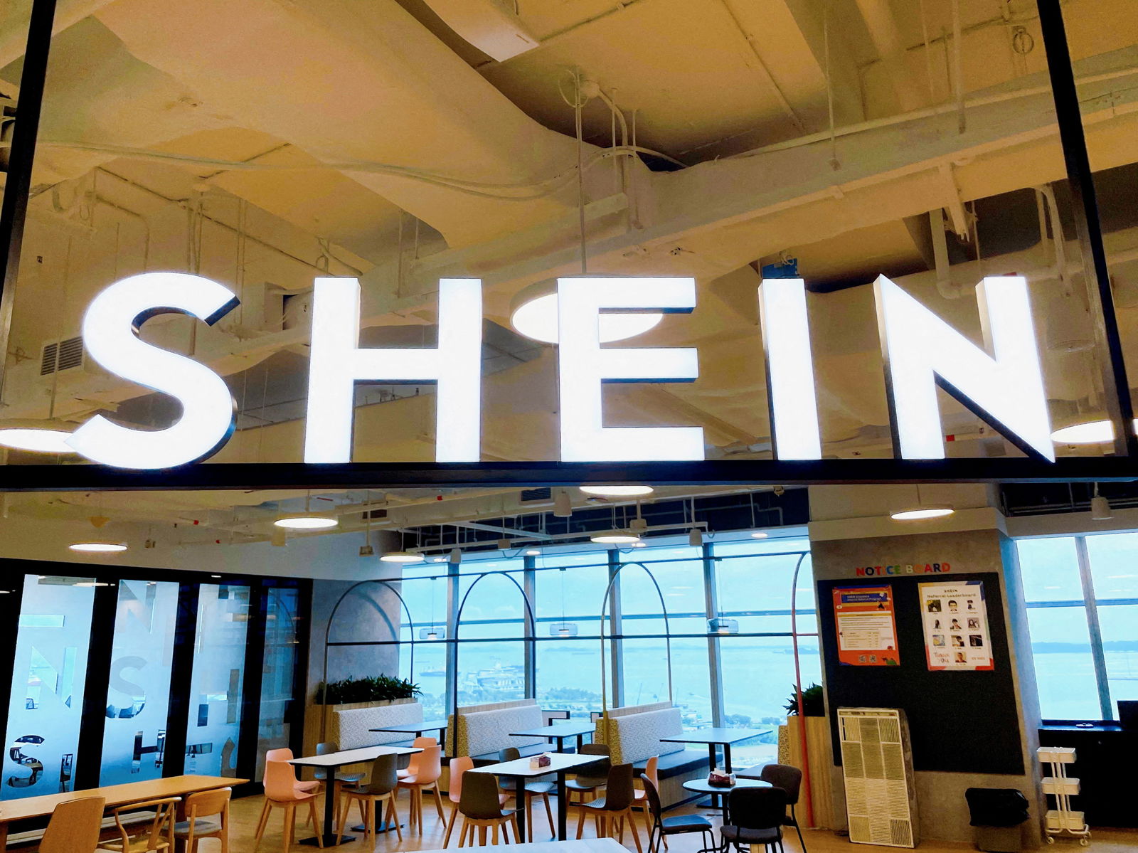 A Shein logo is pictured at the company's office in the central business district of Singapore, October 18, 2022. REUTERS/Chen Lin/File Photo
