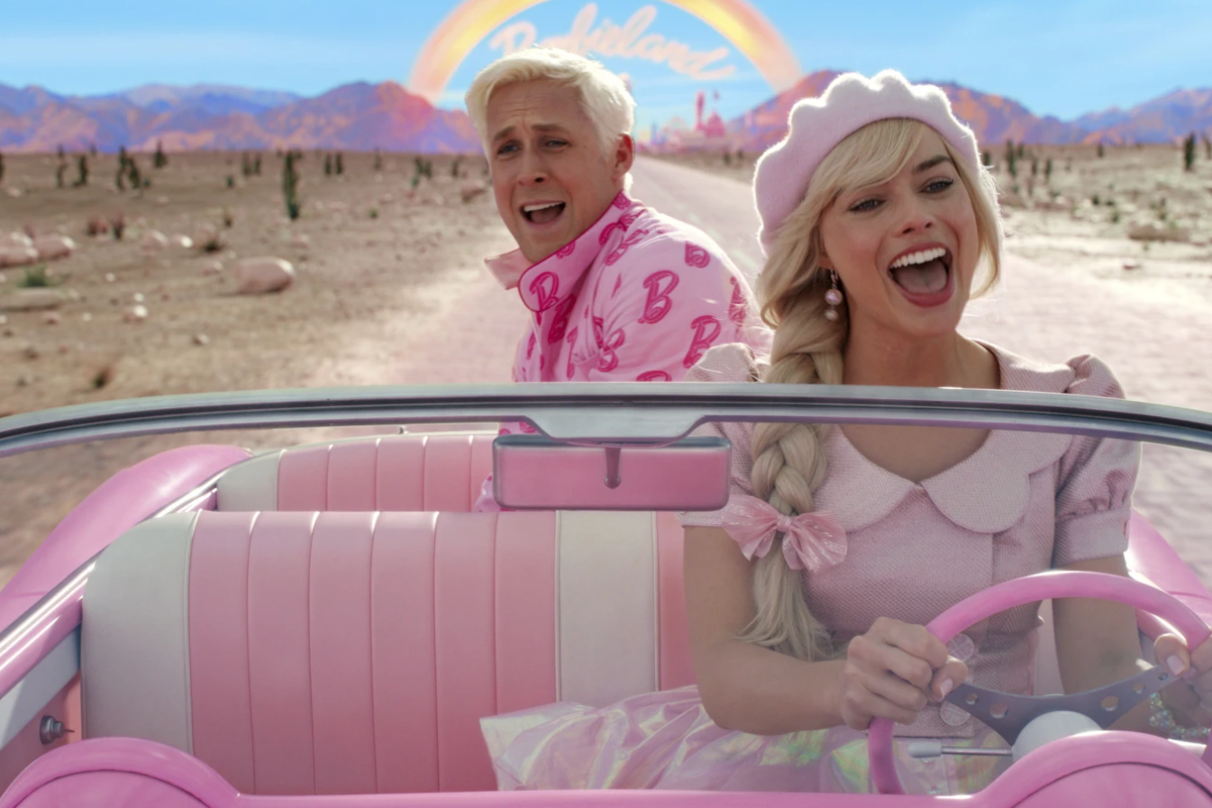 This image released by Warner Bros. Pictures shows Ryan Gosling, left, and Margot Robbie in a scene from "Barbie."