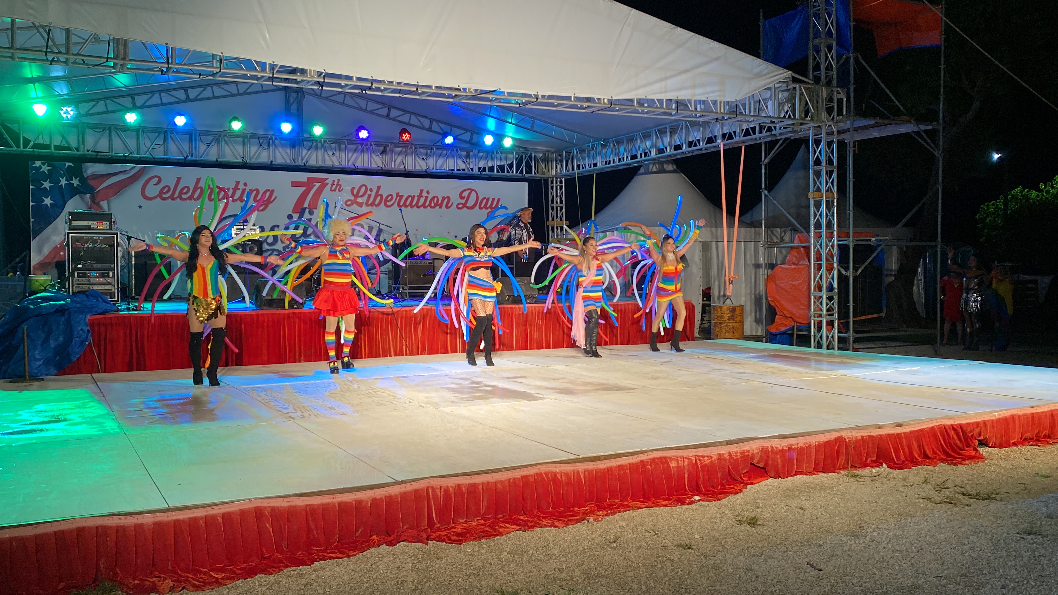 The Amazing Drag Queens take the stage at the 77th Liberation Day closing ceremony.