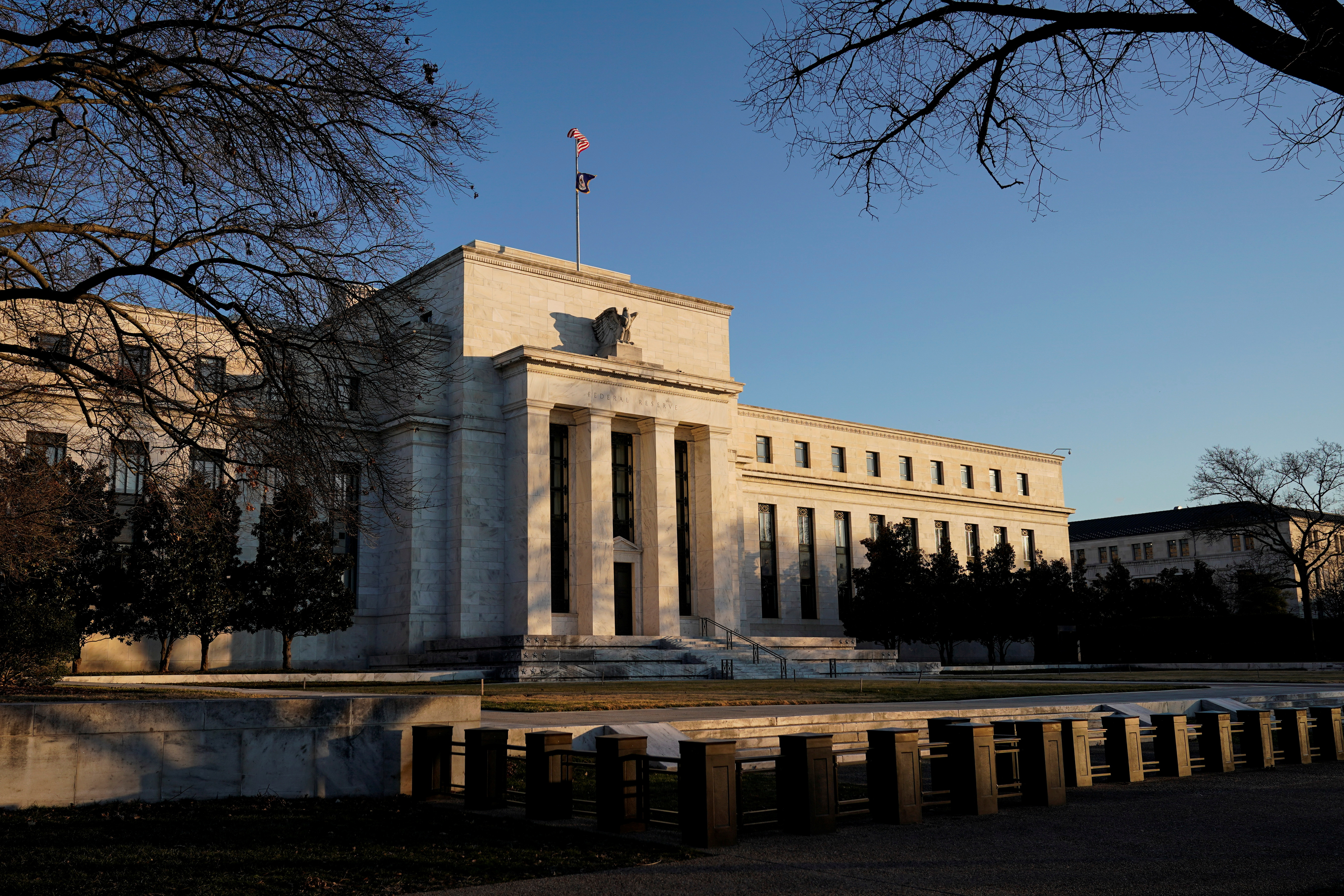 The Federal Reserve building is seen before the Federal Reserve board is expected to signal plans to raise interest rates in March as it focuses on fighting inflation in Washington, U.S., January 26, 2022. REUTERS/Joshua Roberts