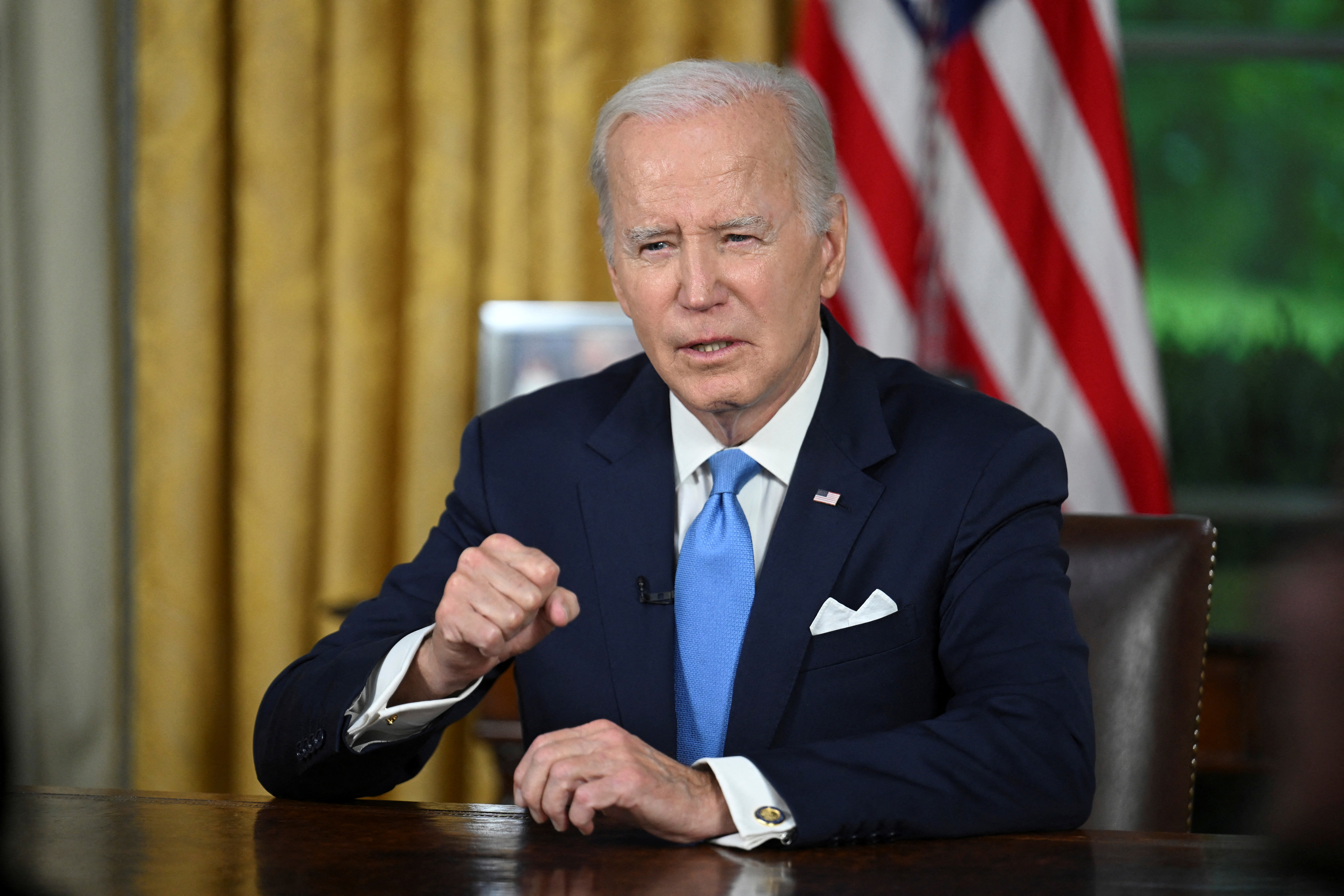 US President Joe Biden addresses the nation on averting default and the Bipartisan Budget Agreement, in the Oval Office of the White House in Washington, DC, June 2, 2023. JIM WATSON/Pool via REUTERS/File Photo