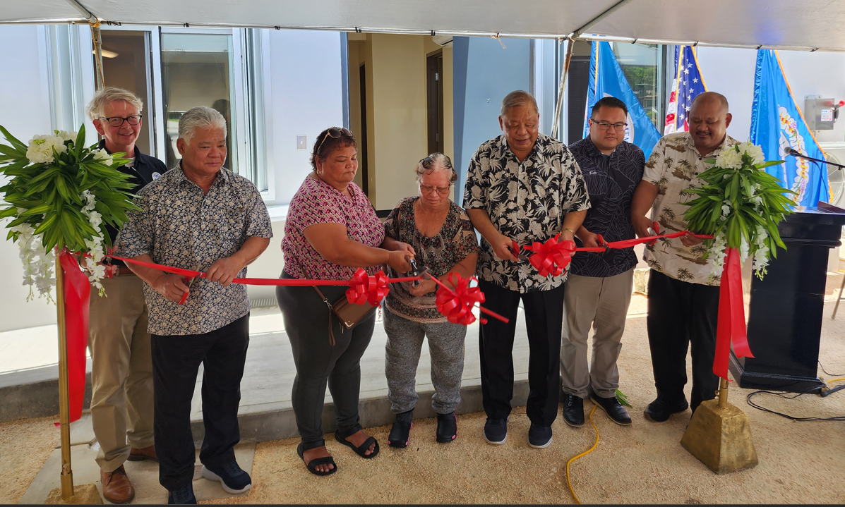 From left, FEMA Long-Term Recovery Office Director Wayne “Randy” Clayton, Gov. Arnold I. Palacios, Ana Agulto Lizama, Joaquina Agulto, Lt. Gov. David M. Apatang, Reps. Manny Castro and Rep. John Paul Sablan cut the ceremonial ribbon for last home built under FEMA’s permanent housing construction program.