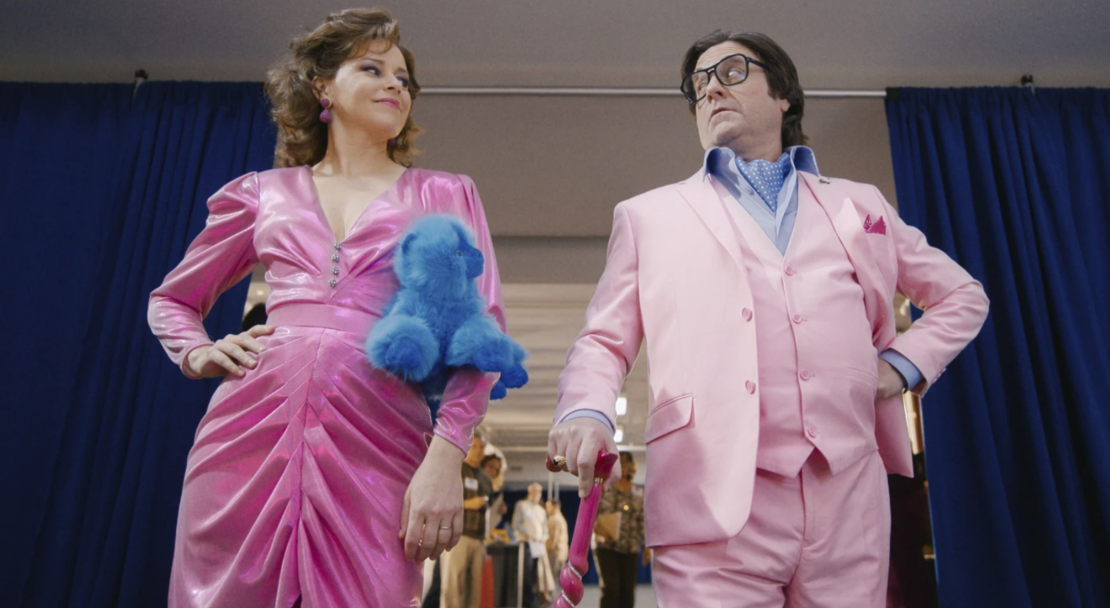 Elizabeth Banks, left, and Zach Galifianakis in a scene from “The Beanie Bubble.”