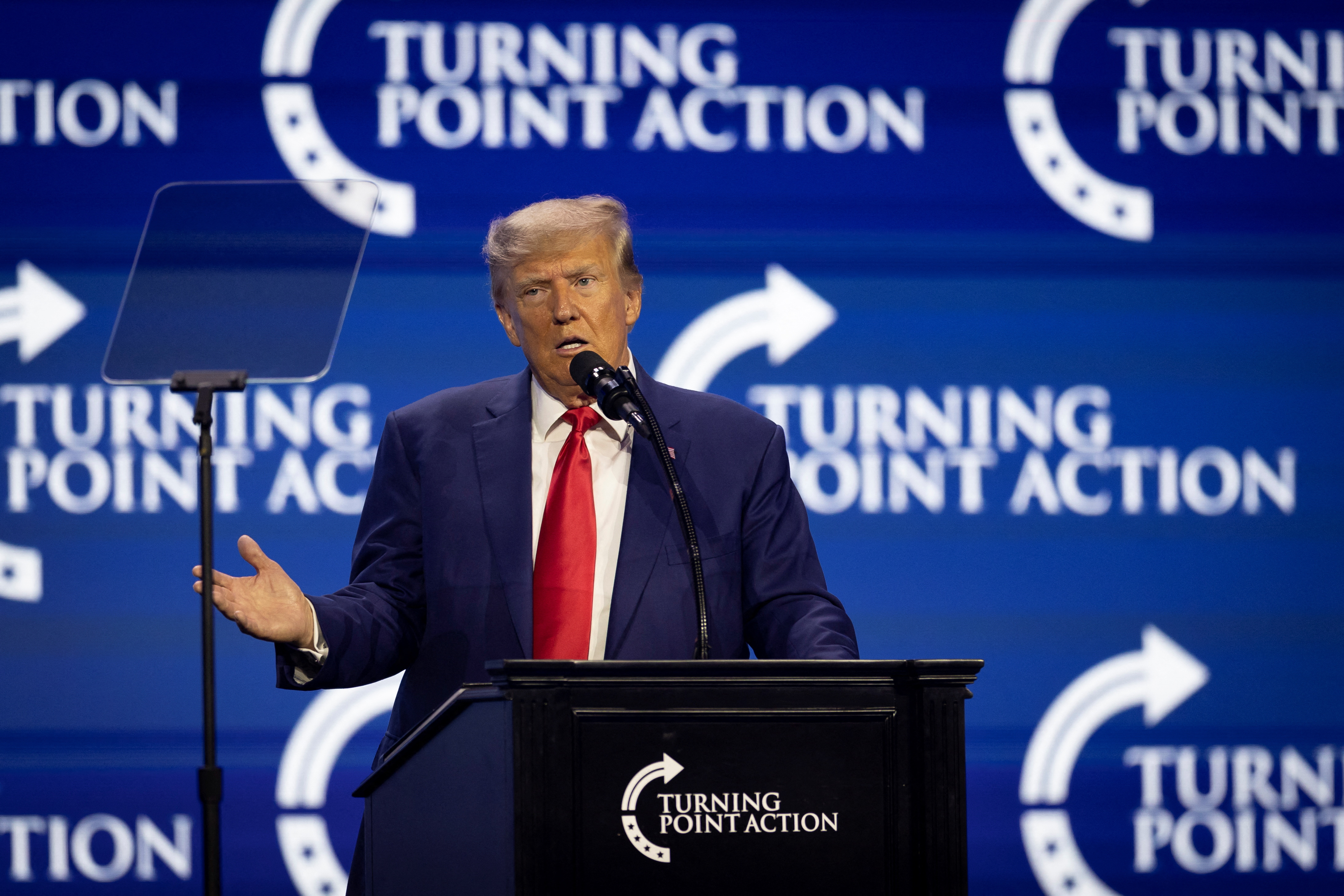 Former U.S. President and Republican presidential candidate Donald Trump gestures as he speaks during the Turning Point Action Conference in West Palm Beach, Florida, U.S. July 15, 2023. REUTERS/Marco Bello/File Photo