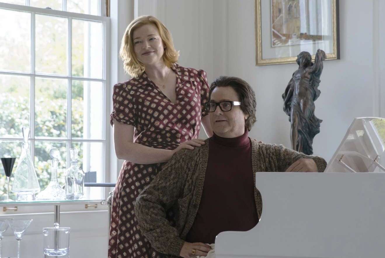 Sarah Snook, left, and Zach Galifianakis in a scene from “The Beanie Bubble.”