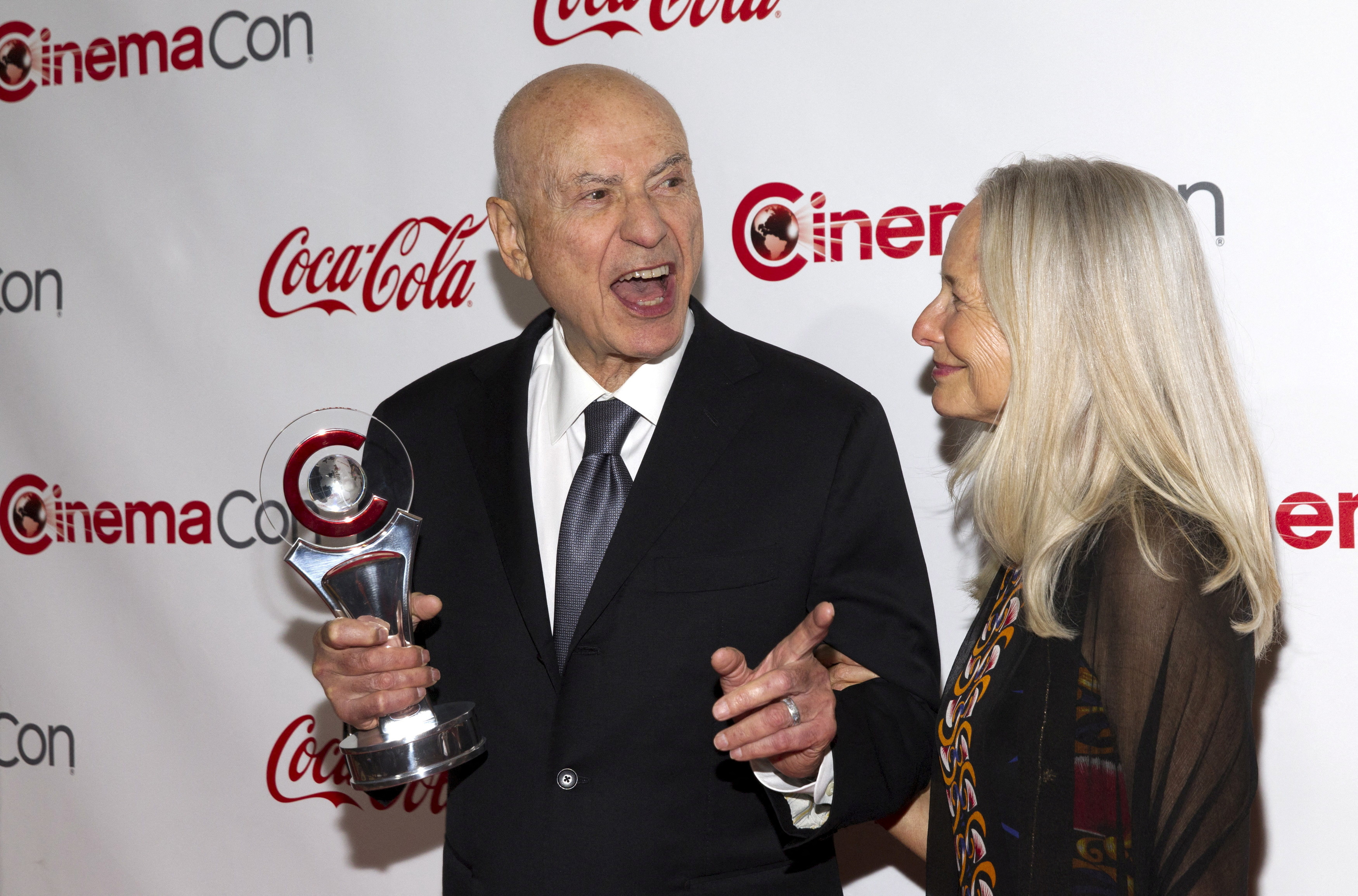 FILE PHOTO: Actor Alan Arkin (L) and his wife actress Suzanne Newlander Arkin pose during the CinemaCon Big Screen Achievement Awards at Caesars Palace in Las Vegas, Nevada April 23, 2015. Alan Arkin was honored with the CinemaCon Lifetime Achievement Award. CinemaCon is the official convention of the National Association of Theatre Owners. REUTERS/Steve Marcus/File Photo