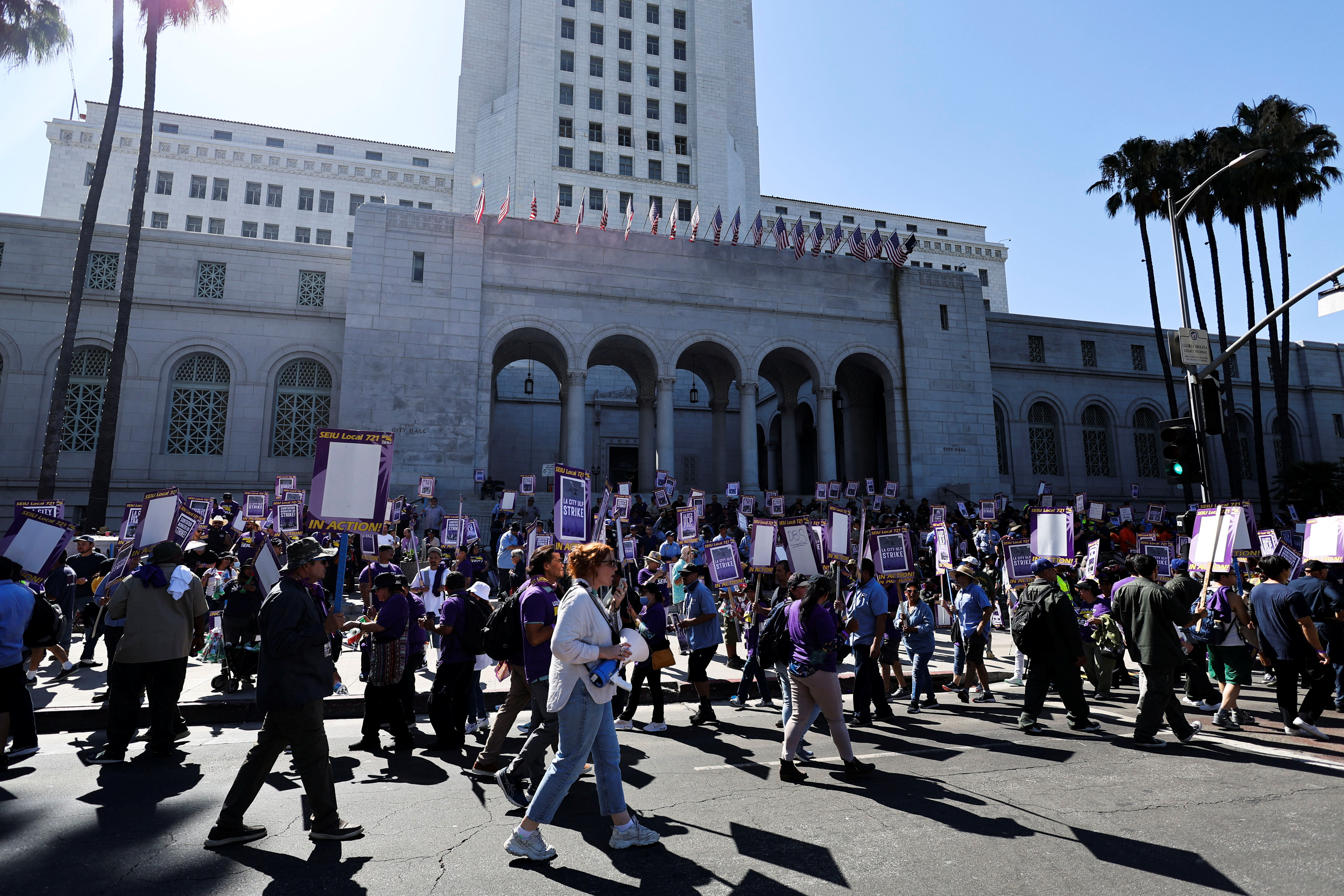 Los Angeles city workers hold a rally outside the city hall during a one-day walkout strike in protest over labor negotiations, in Los Angeles, California, U.S., August 8, 2023. REUTERS/Mike Blake