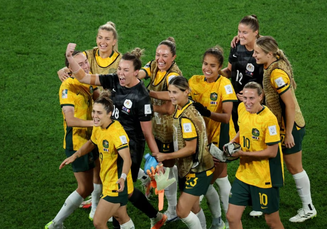 Australia's Mackenzie Arnold celebrates with teammates after winning the penalty shootout against France at Brisbane Stadium in Brisbane, Australia on Saturday, and progressing to the semifinals of the Women’s World Cup.