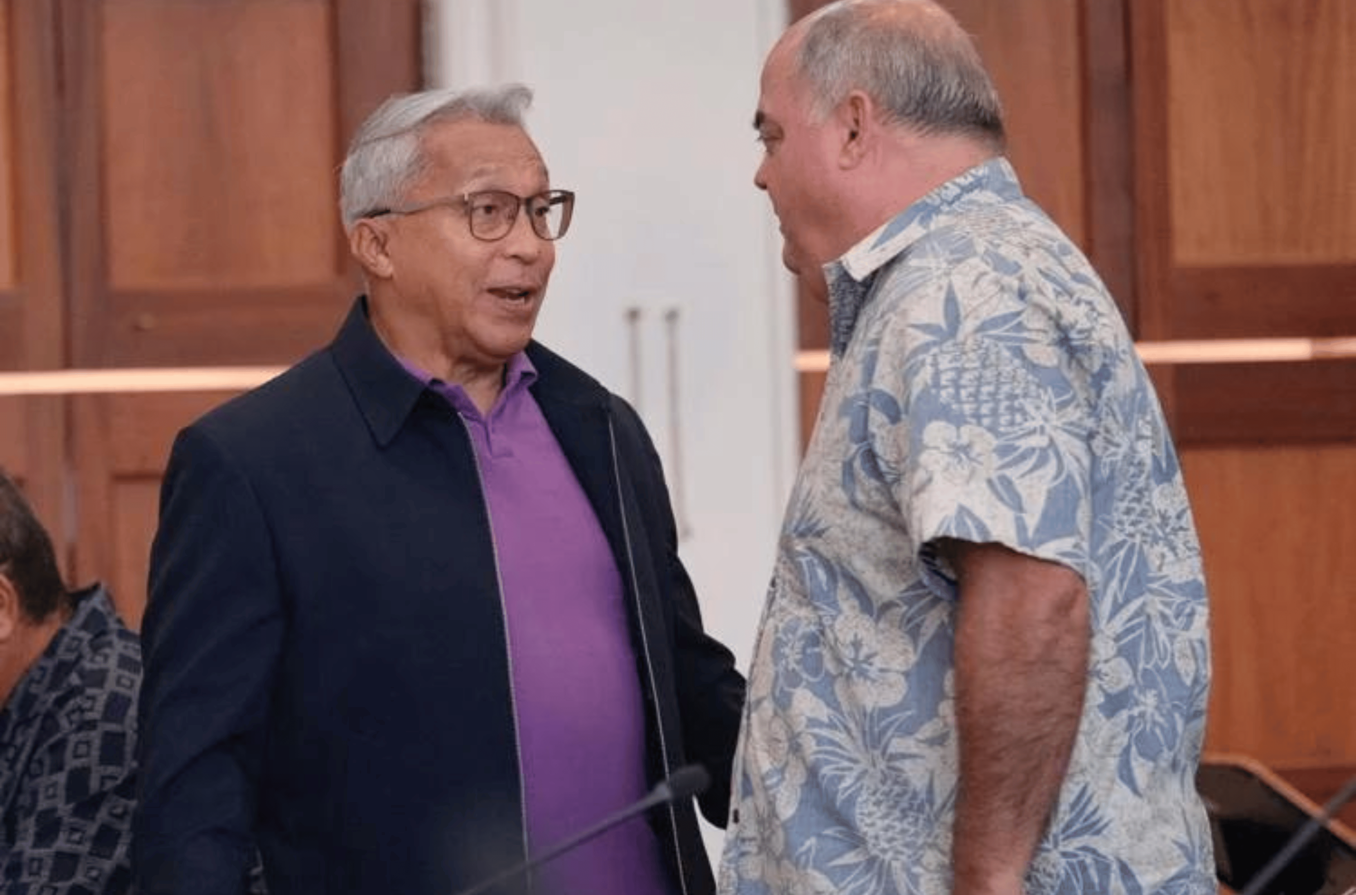 Sens. Jesse Lujan, left, and Chris Duenas converse during a legislative session Wednesday, Aug. 9, 2023, at the Guam Congress Building in Hagåtña.