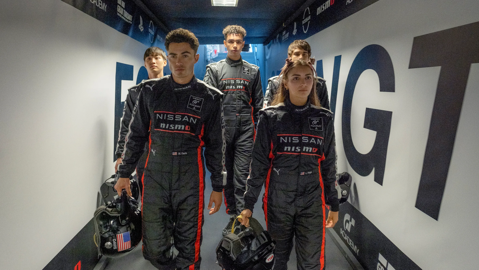 From left, Sang Heon Lee, Darren Barnet, Archie Madekwe, Emelia Hartford and Pepe Barroso Silva in a scene from “Gran Turismo.” 