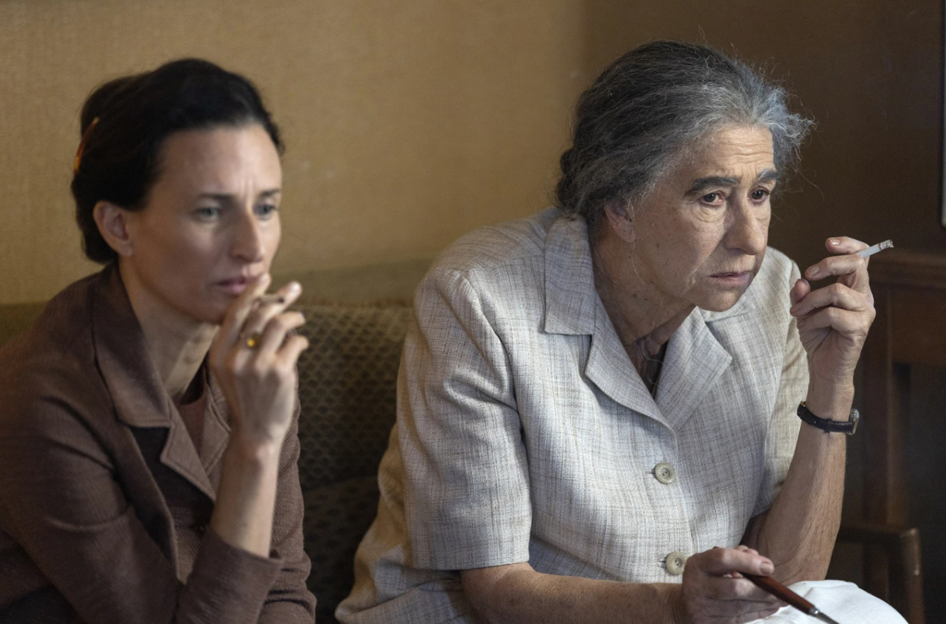 Camille Gotin, left, and Helen Mirren in a scene from the film “Golda.”