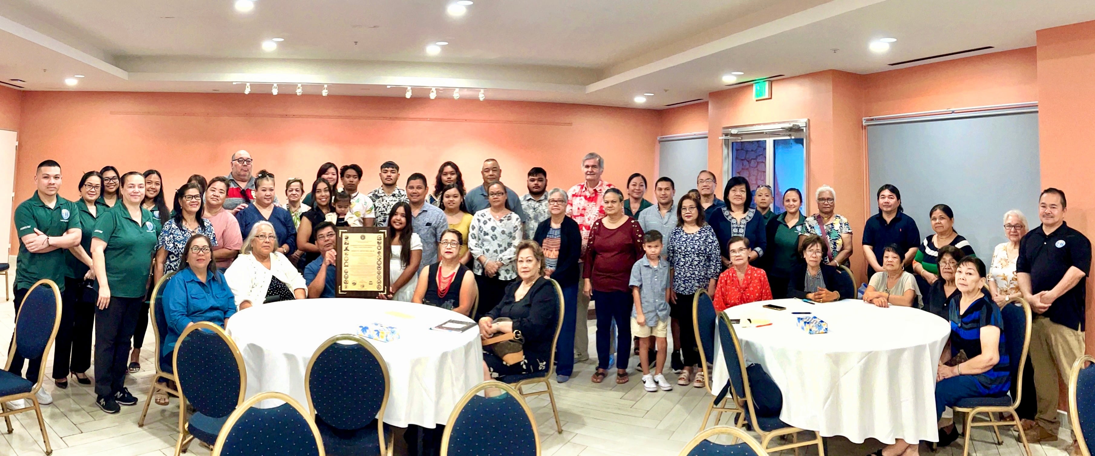 The family of the late education pioneer Joaquina Deleon Guerrero “Kinai” Salas, and her colleagues with the PSS Title I federal program, pose for a photo at Crowne Plaza Hotel on Wednesday after receiving a distinguished public education award which was presented by Commissioner of Education Dr. Alfred B. Ada and Public School System Federal Program Officer Jacqueline Che, among other education officials.