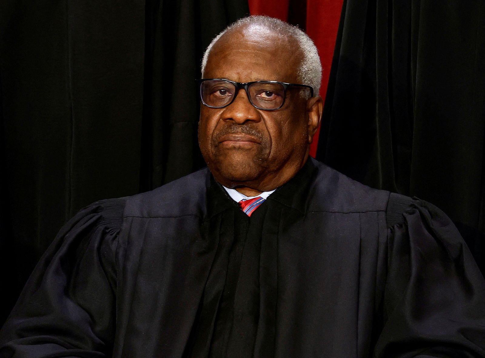 U.S. Supreme Court Associate Justice Clarence Thomas poses during a group portrait at the Supreme Court in Washington, U.S., October 7, 2022. REUTERS/Evelyn Hockstein/File Photo