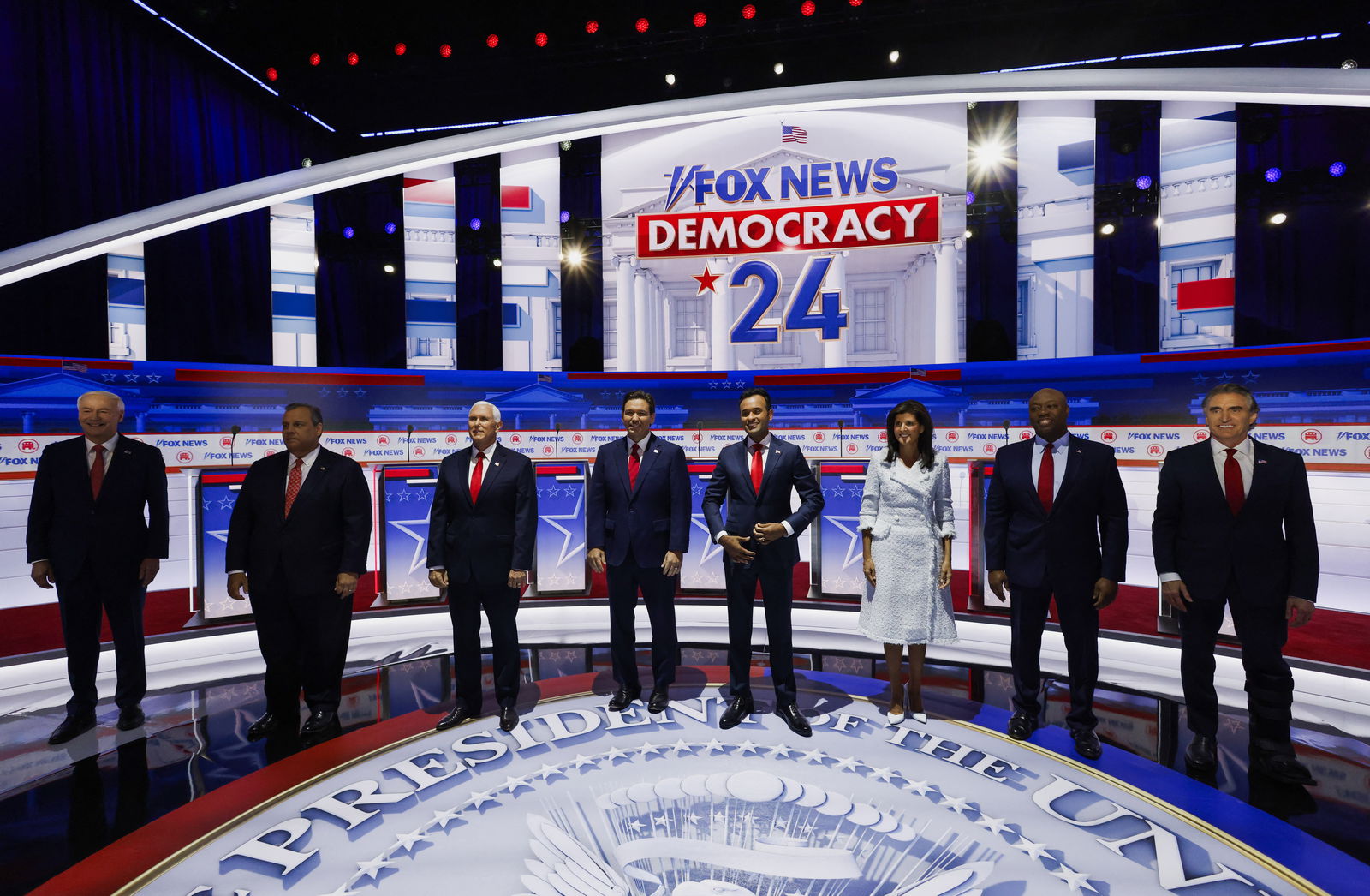 Former Arkansas Governor Asa Hutchinson, former New Jersey Governor Chris Christie, former U.S. Vice President Mike Pence, Florida Governor Ron DeSantis, businessman Vivek Ramaswamy, former South Carolina Governor Nikki Haley, U.S. Senator Tim Scott (R-SC) and North Dakota Governor Doug Burgum pose together before the start before the start of the first Republican candidates' debate of the 2024 U.S. presidential campaign in Milwaukee, Wisconsin, U.S. August 23, 2023. REUTERS/Jonathan Ernst