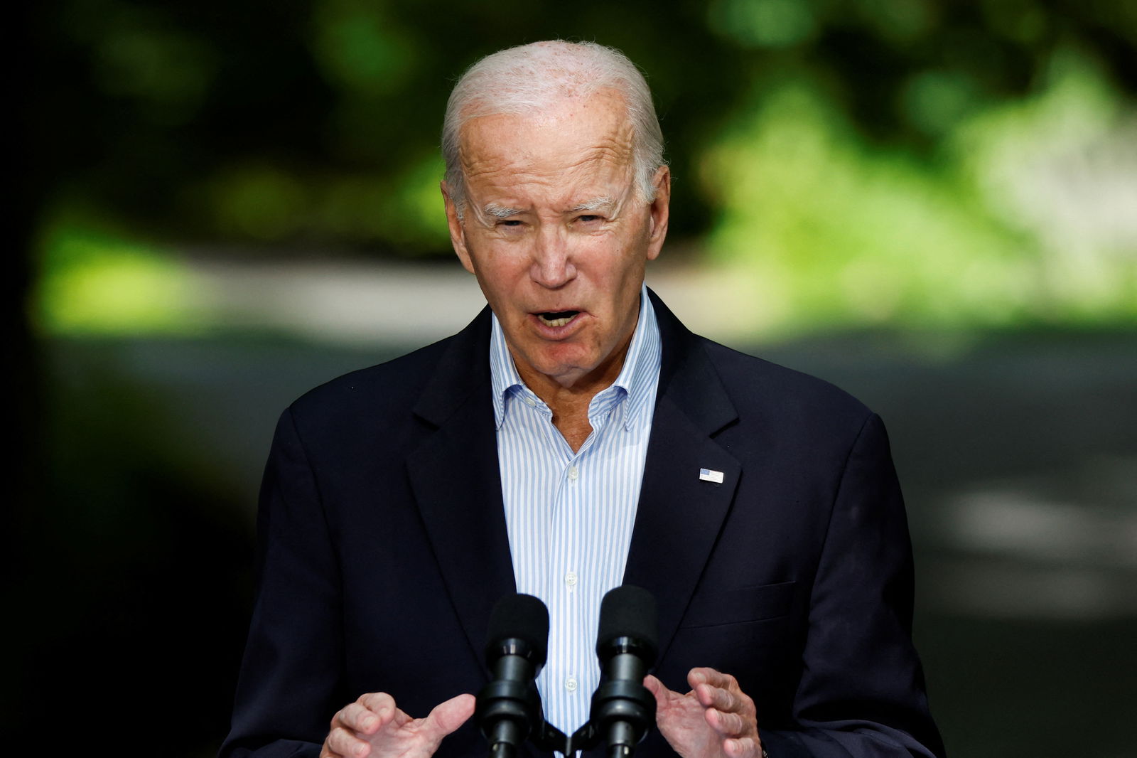 FILE PHOTO: U.S. President Joe Biden speaks during a joint press conference with Japanese Prime Minister Fumio Kishida and South Korean President Yoon Suk Yeol (not pictured) during the trilateral summit at Camp David near Thurmont, Maryland, U.S., August 18, 2023. REUTERS/Evelyn Hockstein/File Photo