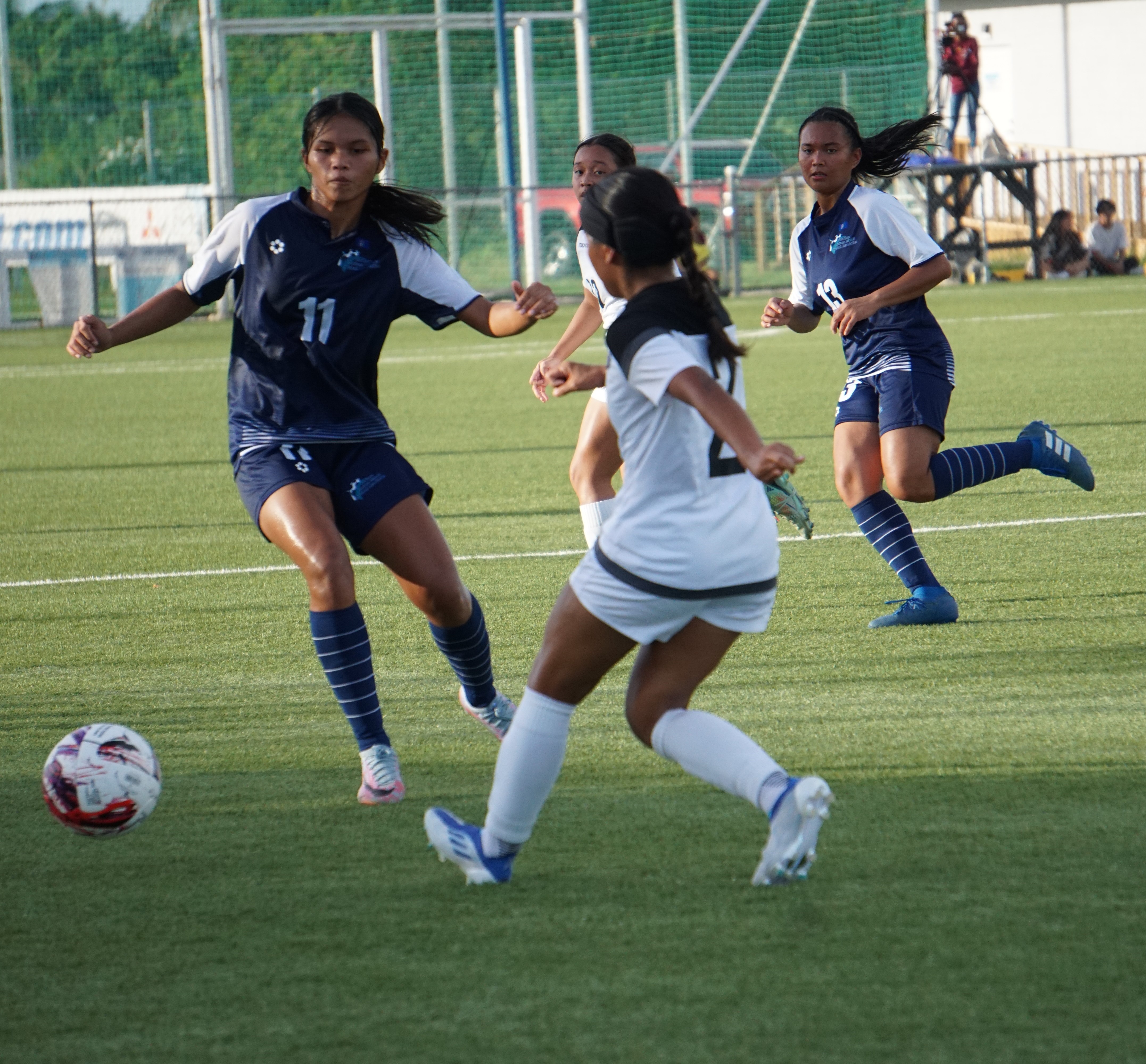 The NMI's Summer Manahane attempts an interception against Guam during a Marianas Football Cup game Thursday at the NMI Soccer Training Center in Koblerville.