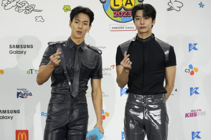 Shownu, left, and Hyungwon of South Korean boy group Monsta X, attend KCON at the Los Angeles Convention Center.