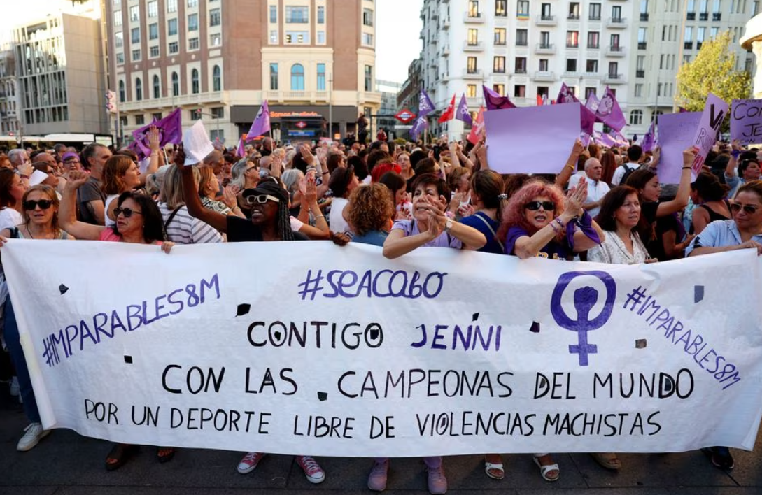 People hold banners during a protest against Royal Spanish Football Federation President Luis Rubiales at Plaza Callao, Madrid, Spain, Aug. 28, 2023.