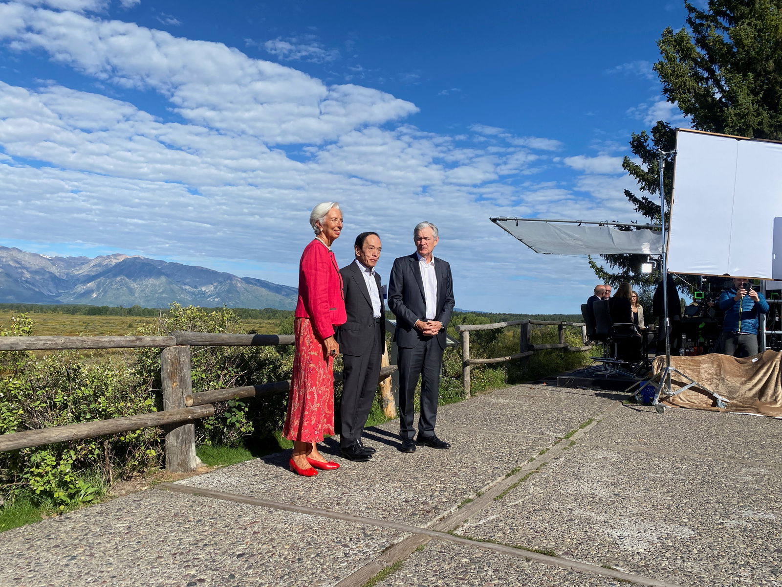 Federal Reserve Chair Jerome Powell, European Central Bank President Christine Lagarde, and Bank of Japan Governor Kazuo Ueda take a break outside while attending the Kansas City Federal Reserve Bank's annual Economic Policy Symposium in Jackson Hole, Wyoming, Aug. 25, 2023.