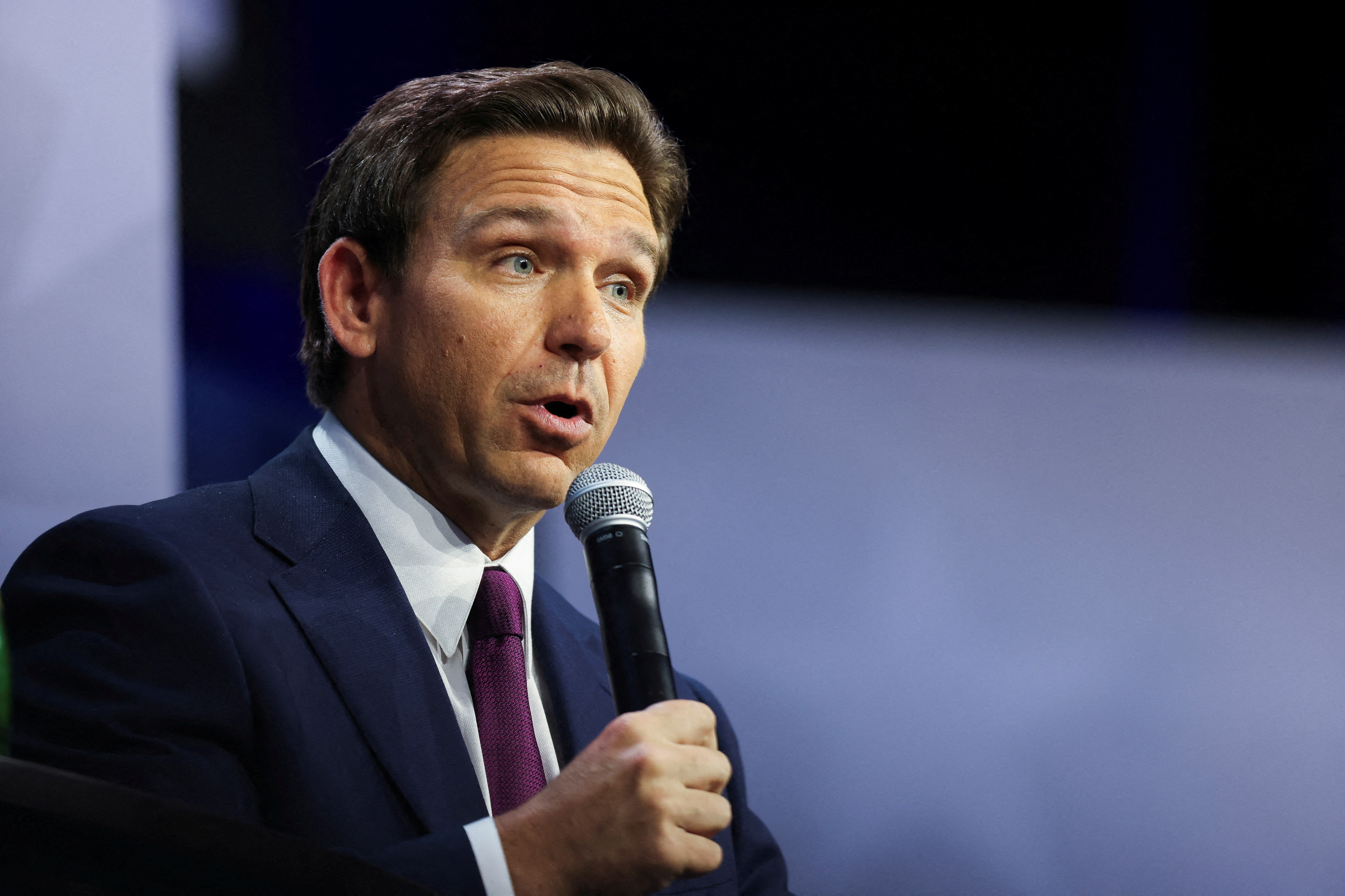 Florida Governor Ron Desantis speaks as he is interviewed by Former Fox News commentator Tucker Carlson (not pictured) during the Family Leadership Summit at the Iowa Events Center, in Des Moines, Iowa, U.S., July 14, 2023. REUTERS/Scott Morgan