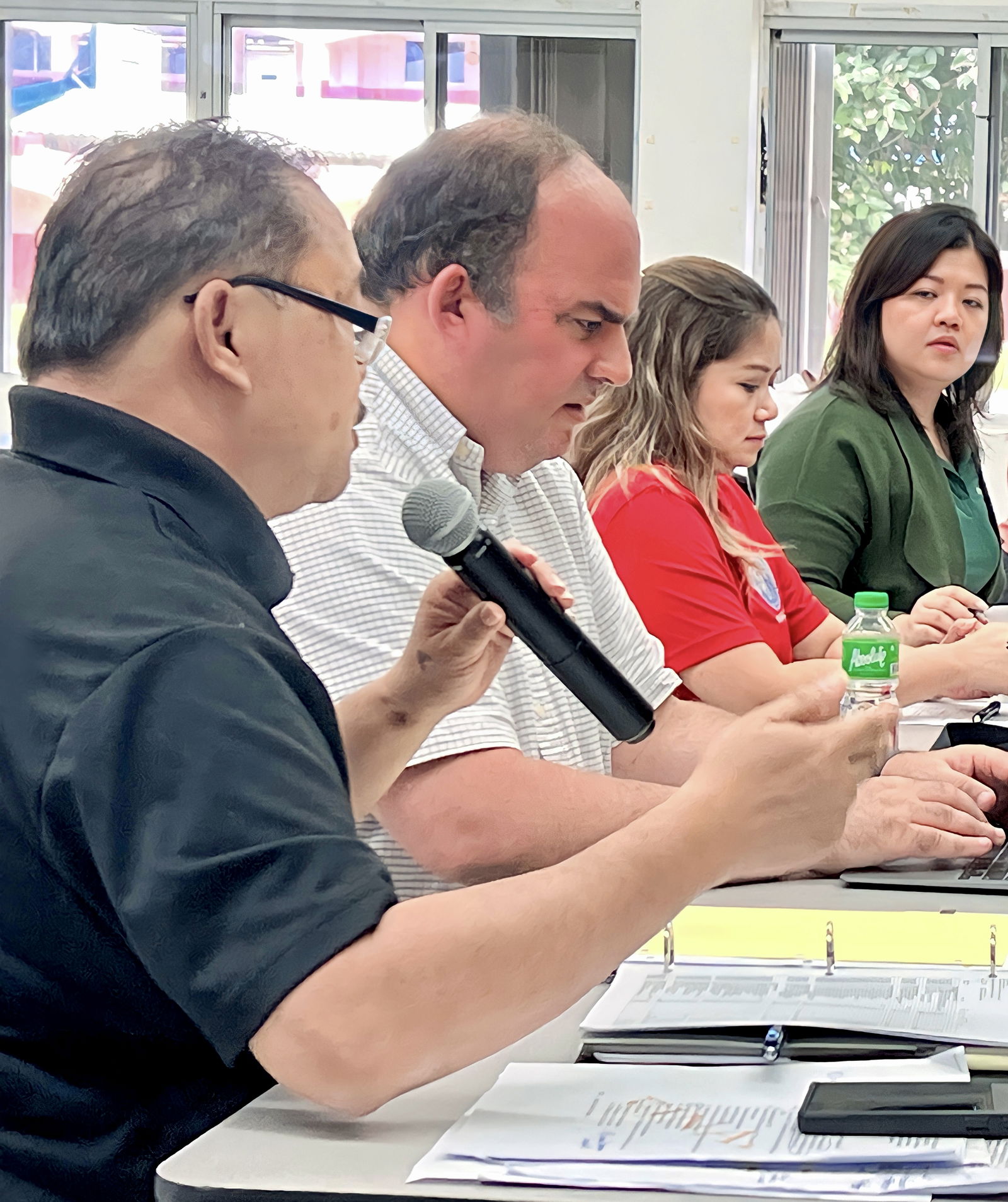 Commissioner of Education Dr. Alfred B. Ada, left, speaks during the Board of Education meeting on Tinian. Also in photo are legal counsel Michael Ernest, Public School System Finance and Budget Director Arlene Lizama, and Federal Programs Officer Jacqueline Che.