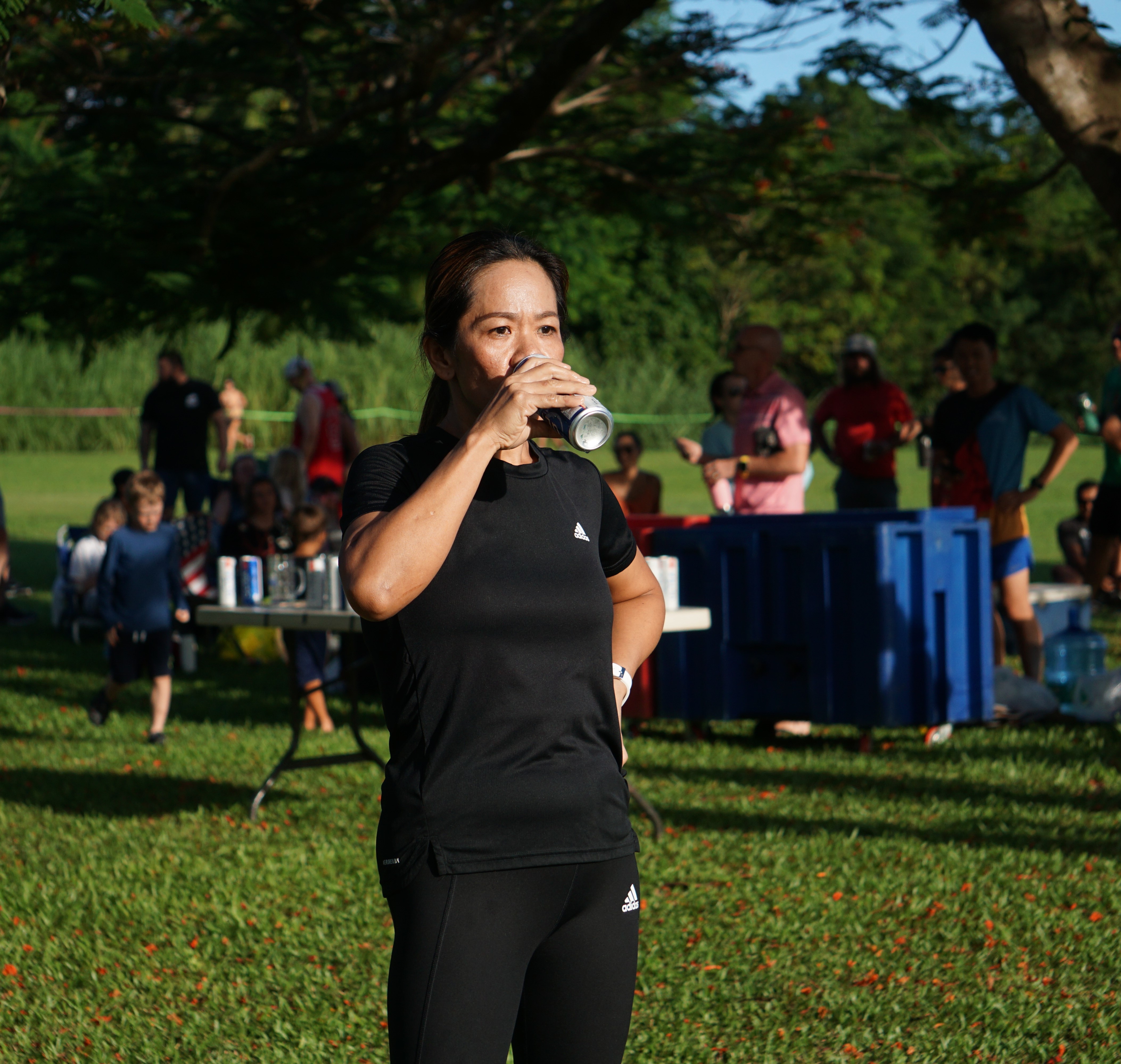 Rosemarie Chisato takes her time to down a can of Michelob Ultra during the 2nd Annual Michelob Ultra Beer Mile on Friday at Saipan Vegas golf course.