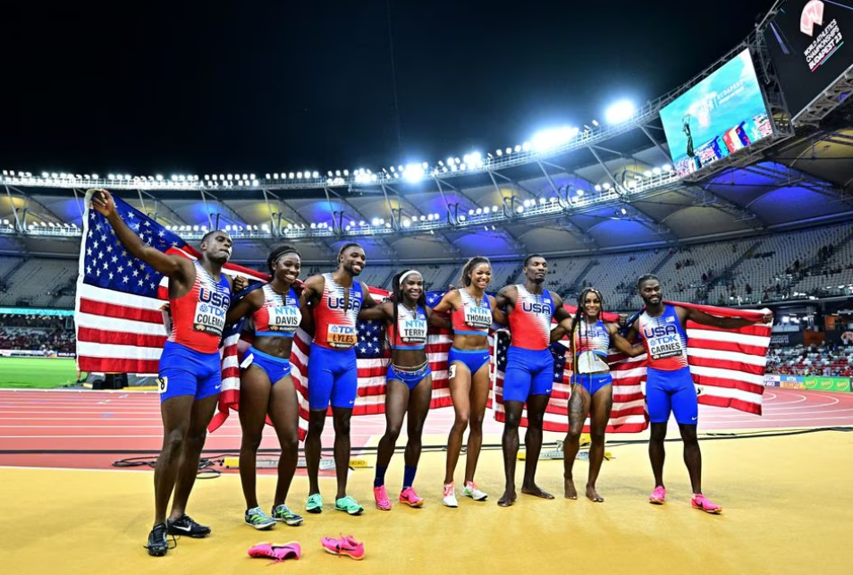 Men and women's 4x100m relay gold medalists Tamari Davis, Twanisha Terry, Gabrielle Thomas, Sha'carri Richardson, Christian Coleman, Fred Kerley, Brandon Carnes and Noah Acquire of the U.S. at the National Athletics Centre in Budapest, Hungary, Aug. 26, 2023